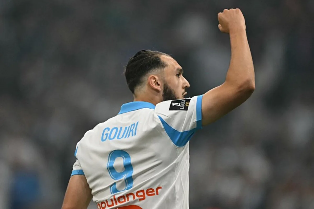 Marseille's Algerian forward #09 Amine Gouiri celebrates scoring his team's second goal during the French L1 football match between Olympique de Marseille (OM) and Stade Rennais FC at the Stade Velodrome in Marseille, southern France, on May 17, 2026. Gabriel BOUYS / AFP