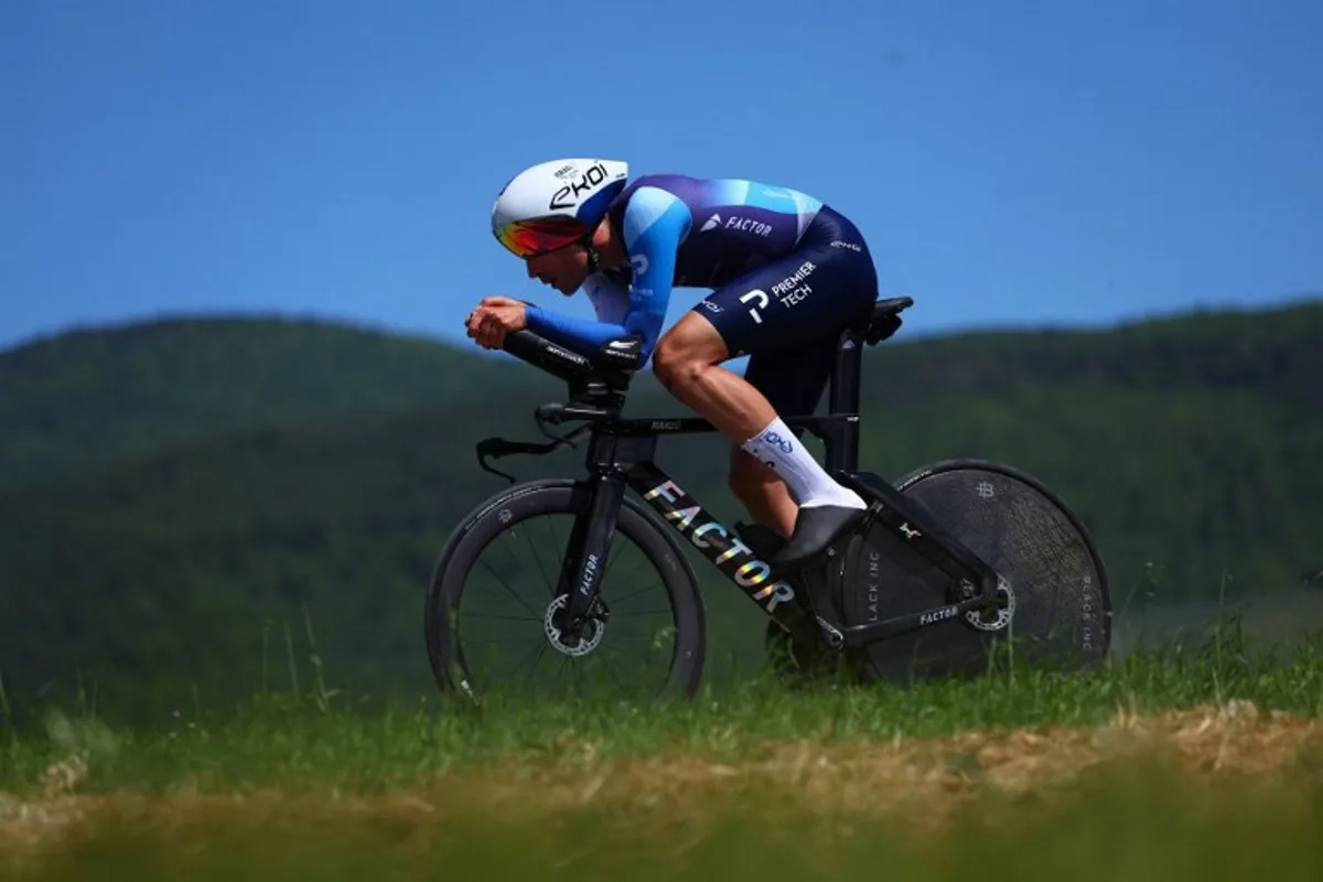 Team Israel Premier Tech's British rider Ethan Vernon competes during the 7th stage of the 107th Giro d'Italia cycling race, an individual time trial between Foligno and Perugia, on May 10, 2024 in Foligno.   Luca Bettini / AFP