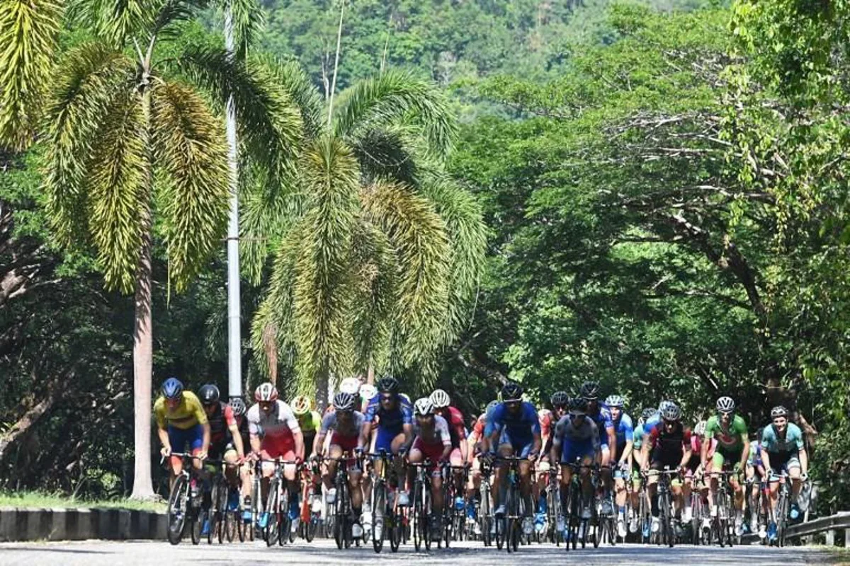 Cyclists ride during the eighth and final stage of the Malaysian Le Tour de Langkawi cycling race from Dataran Lang to Kuah in Langkawi on April 13, 2019. Mohd RASFAN / AFP