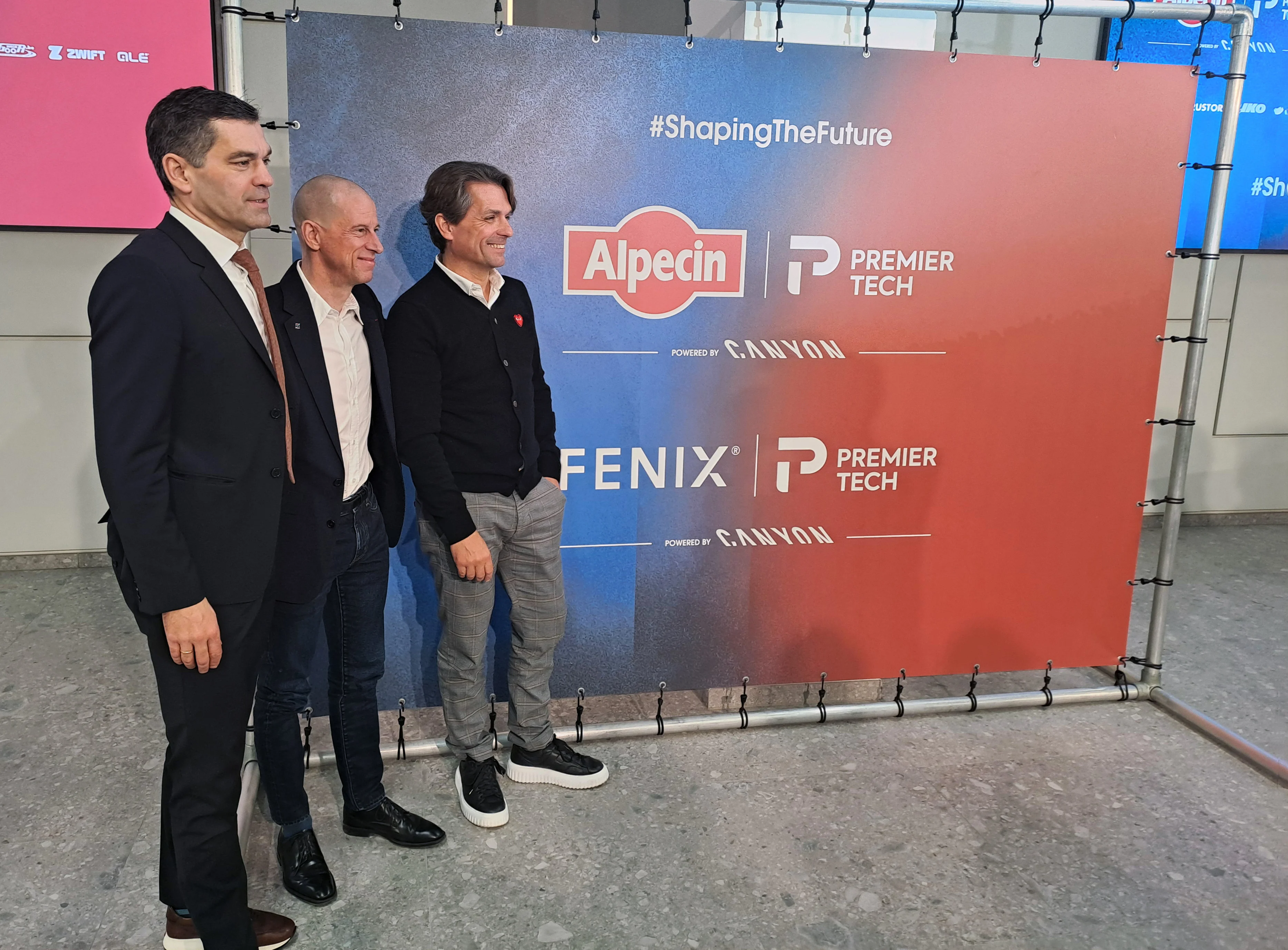 Alpecin-Deceuninck team manager Philip Roodhooft, Premier Tech CEO Jean Belanger and Alpecin-Deceuninck team manager Christoph Roodhooft pictured during a press conference of the Alpecin-Deceuninck and Alpecin-Fenix cycling team to announce their new sponsor Premier Tech, Friday 05 December 2025 in Antwerp. Premier Tech will replace Deceuninck as name sponsor of the Alpecin team from 2026. BELGA PHOTO TOON SACRE