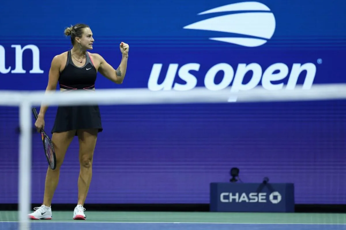 Belarus's Aryna Sabalenka reacts as she plays USA's Jessica Pegula in their women's singles semifinal tennis match on day twelve of the US Open tennis tournament at the USTA Billie Jean King National Tennis Center in New York City on September 4, 2025. CHARLY TRIBALLEAU / AFP