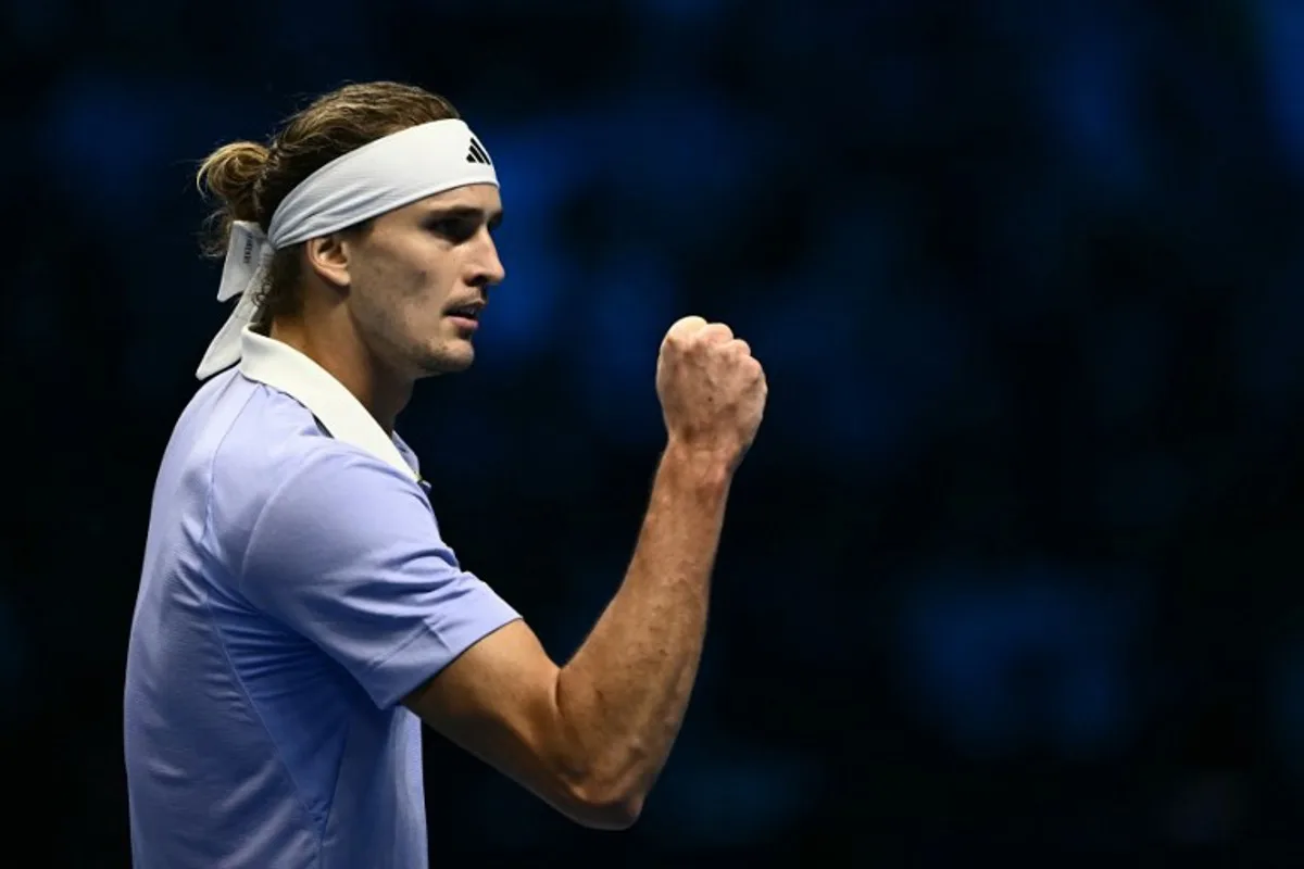 Germany's Alexander Zverev reacts during his match against Norway's Casper Ruud at the ATP Finals tennis tournament in Turin on November 13, 2024.  Marco BERTORELLO / AFP