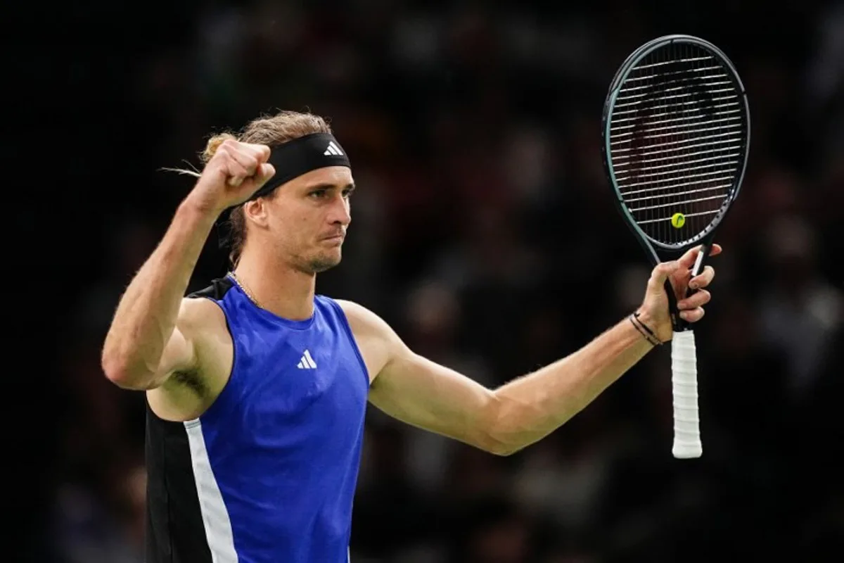 Germany's Alexander Zverev celebrates after winning against Greece's Stefanos Tsitsipas at the end of their men's singles quarter final match on day five of the Paris ATP Masters 1000 tennis tournament at the Accor Arena - Palais Omnisports de Paris-Bercy - in Paris on November 1, 2024.  Dimitar DILKOFF / AFP