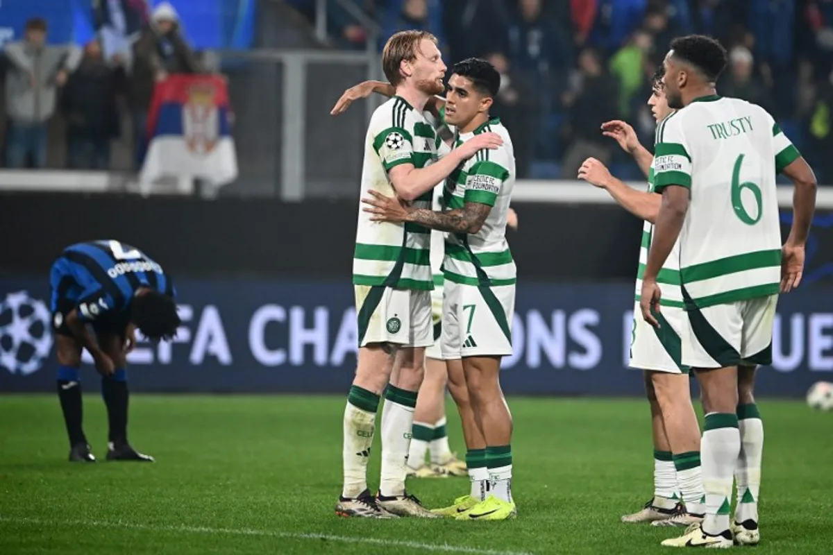 Celtic's Honduras forward #07 Luis Palma greets teammates at the end of the Champions League football match between Atalanta and Celtic at the Gewiss Stadium in Bergamo, on October 23, 2024.   Isabella BONOTTO / AFP