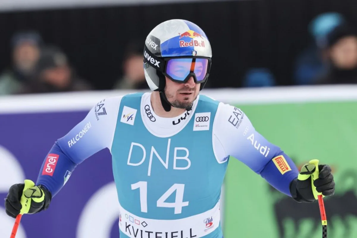 Italy's Dominik Paris reacts in the finish area during the men's downhill World Cup race in Kvitfjell, Norway on March 8, 2025.   Geir Olsen / NTB / AFP