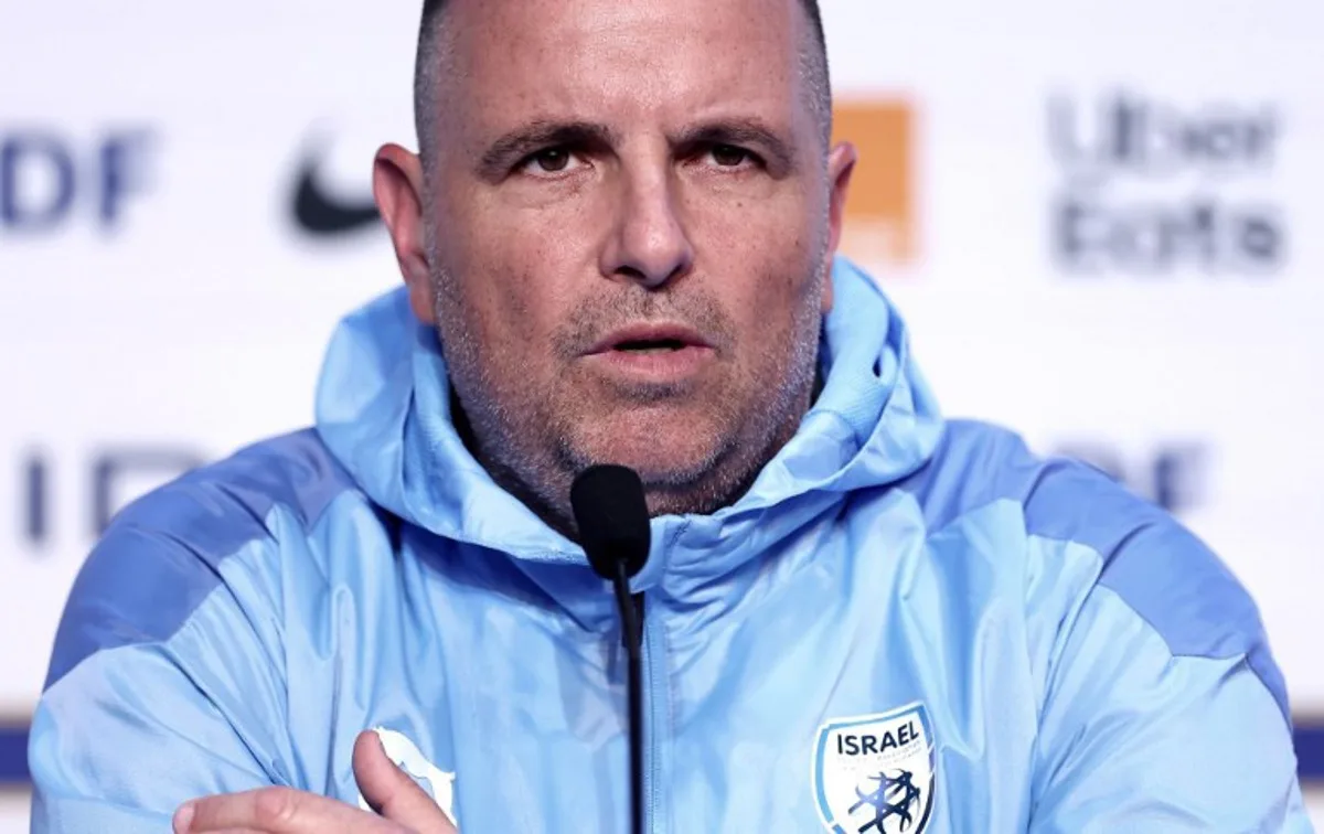 Israel's headcoach Ran Ben Shimon addresses the media during a press conference at the Stade de France, in Saint-Denis, north of Paris, on November 13, 2024, on the eve of the UEFA Nations League League A Group A2 football match between France and Israel.  FRANCK FIFE / AFP