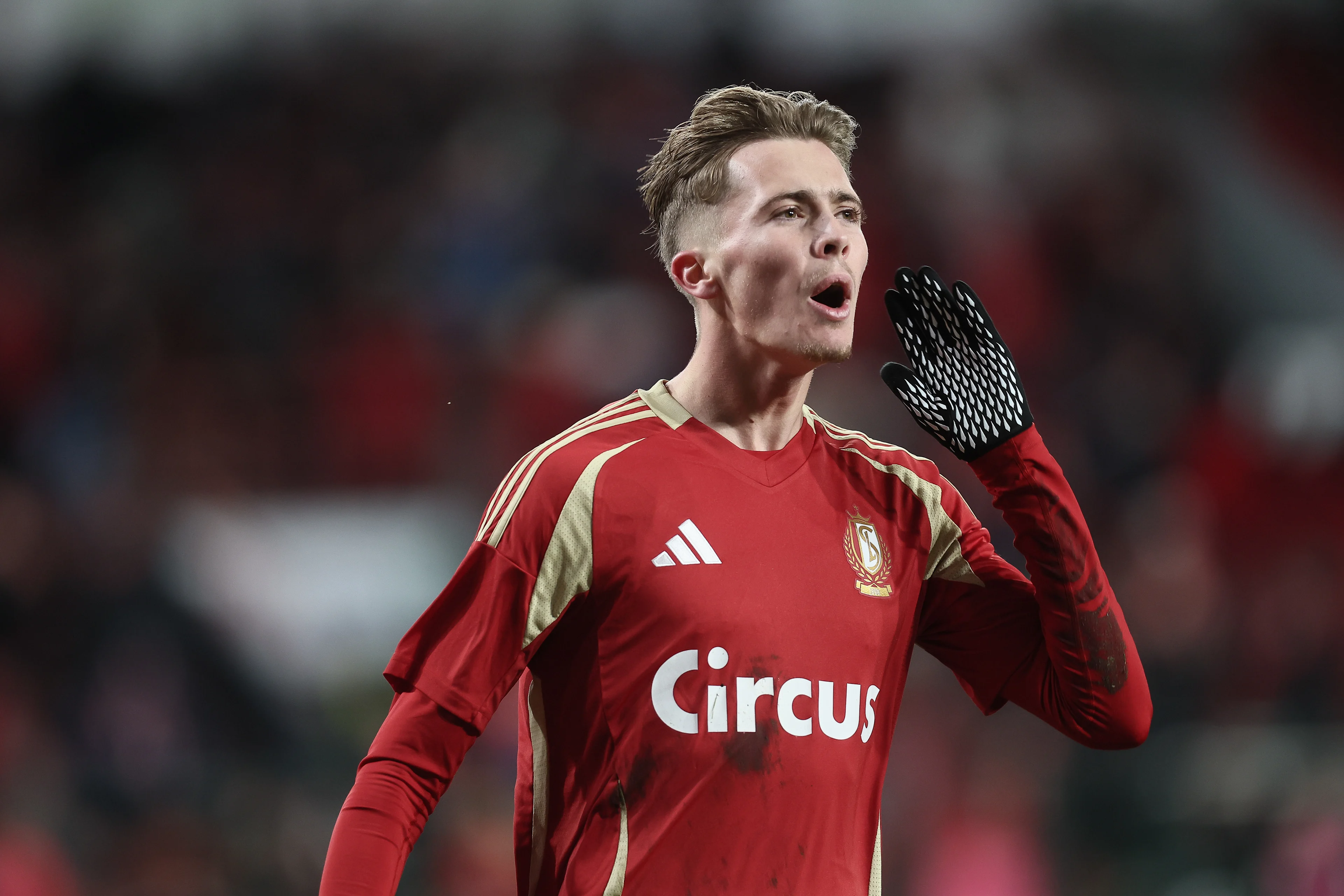 Standard's Isaac Price celebrates after scoring during a soccer game between Standard de Liege and Kaa Gent, Sunday 22 December 2024 in Liege, on day 19 of the 2024-2025 season of the "Jupiler Pro League" first division of the Belgian champiosnhip. BELGA PHOTO BRUNO FAHY