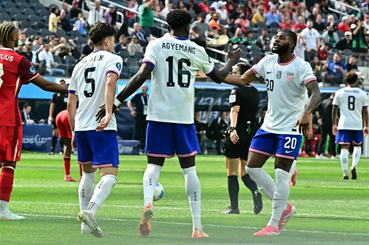 USA's forward #16 Patrick Agyemang celebrates with teammates after scoring his team's first goal during the CONCACAF Nations League third place final football match between USA and Canada at SoFi Stadium in Inglewood, California, on March 23, 2025. Frederic J. Brown / AFP