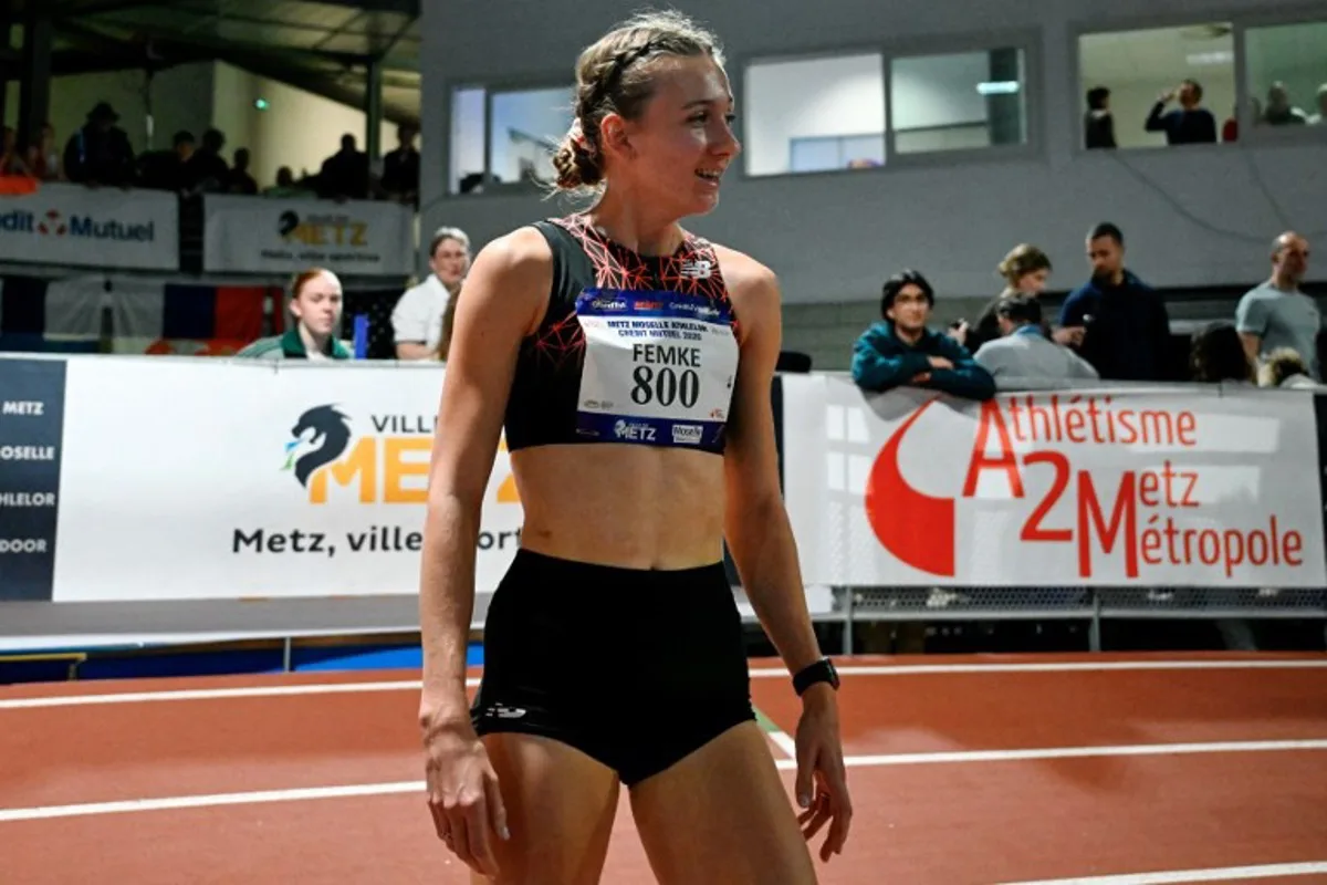 Netherlands' athlete Femke Bol reacts after winning the women's 800m final during the Athlelor indoor meeting at L'Anneau athletics hall in Metz on February 8, 2026.  On October 10, 2025, Femke Bol announced her retirement from the 400-meter hurdles, the event in which she is a two-time world champion. The 25-year-old athlete then announced her intention to focus on the 800 meters. Jean-Christophe VERHAEGEN / AFP