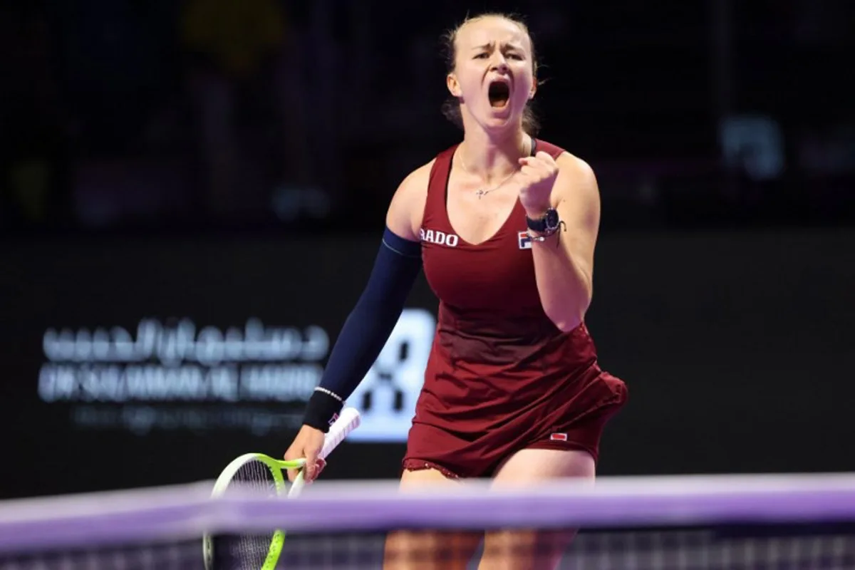 Czech Republic's Barbora Krejcikova reacts after winning against US' Jessica Pegula during their women's singles tennis match at the WTA Finals Championship in Riyadh on November 5, 2024.  Fayez NURELDINE / AFP