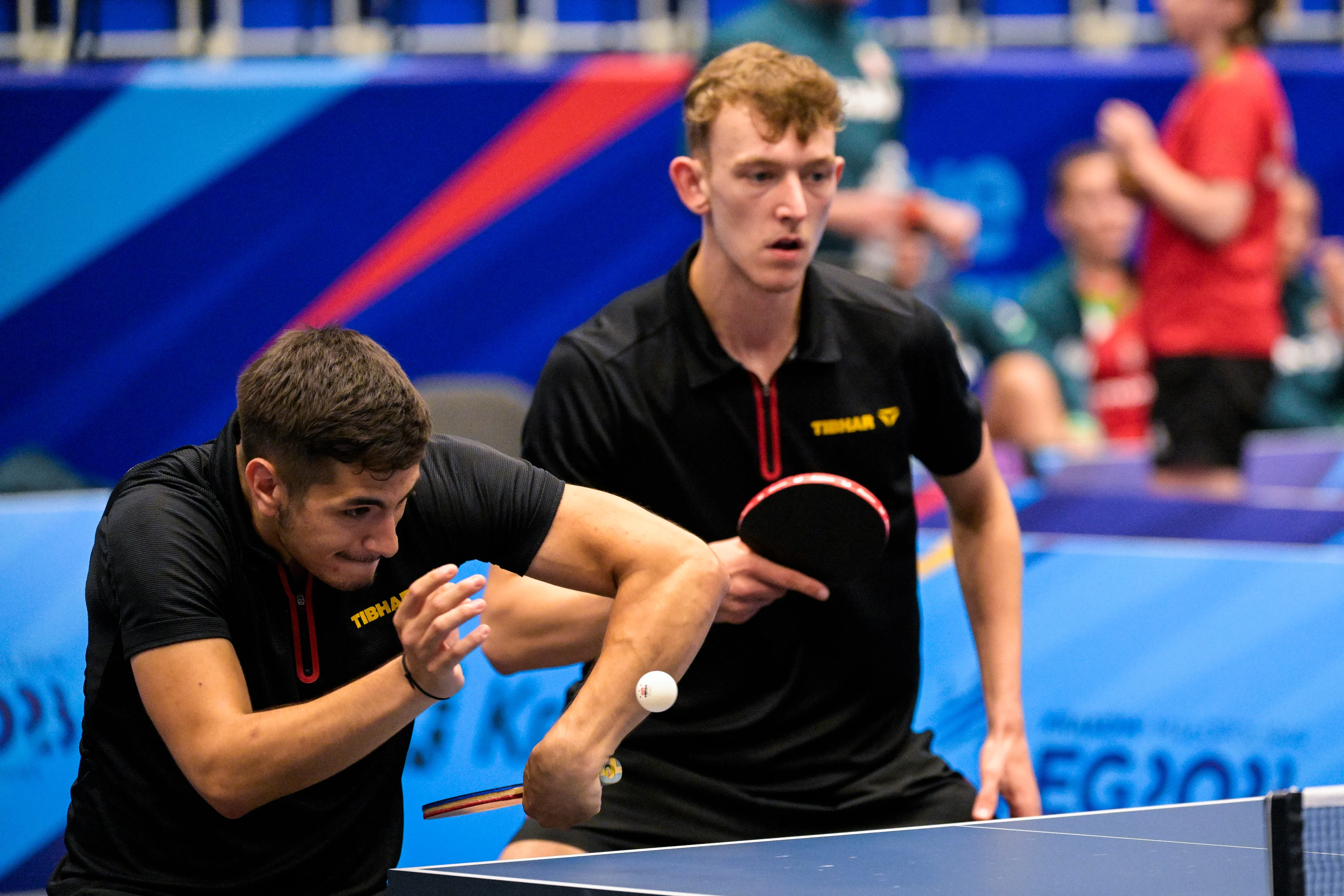 Table Tennis player Martin Allegro and Table Tennis player Adrien Rassenfosse pictured in action during a match in the Men's Team Quarterfinal between Belgium and Germany, in the Table Tennis competition at the European Games in Krakow, Poland on Thursday 29 June 2023. The 3rd European Games, informally known as Krakow-Malopolska 2023, is a scheduled international sporting event that will be held from 21 June to 02 July 2023 in Krakow and Malopolska, Poland. BELGA PHOTO LAURIE DIEFFEMBACQ