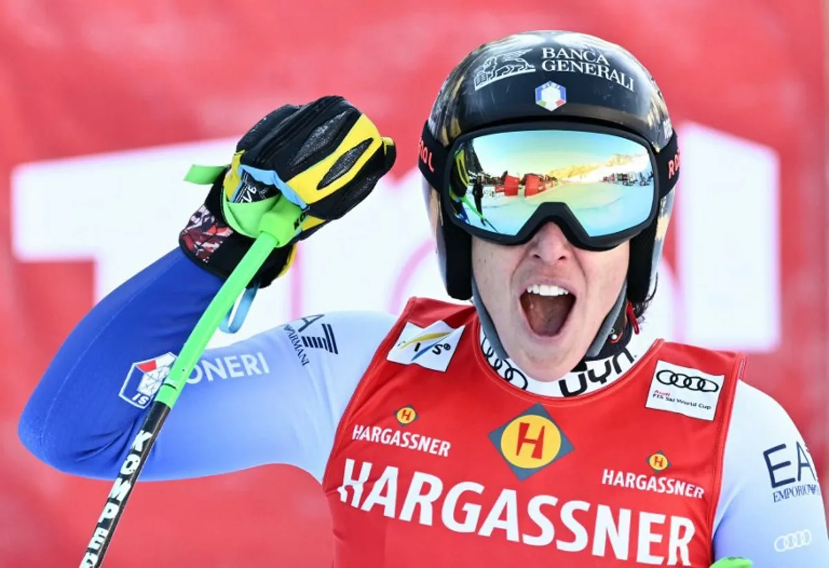 Italy's Federica Brignone reacts after her run in the Women's Downhill race as part of the FIS Alpine Ski World Cup in Sankt Anton am Arlberg, Austria, on January 11, 2025.  Joe Klamar / AFP