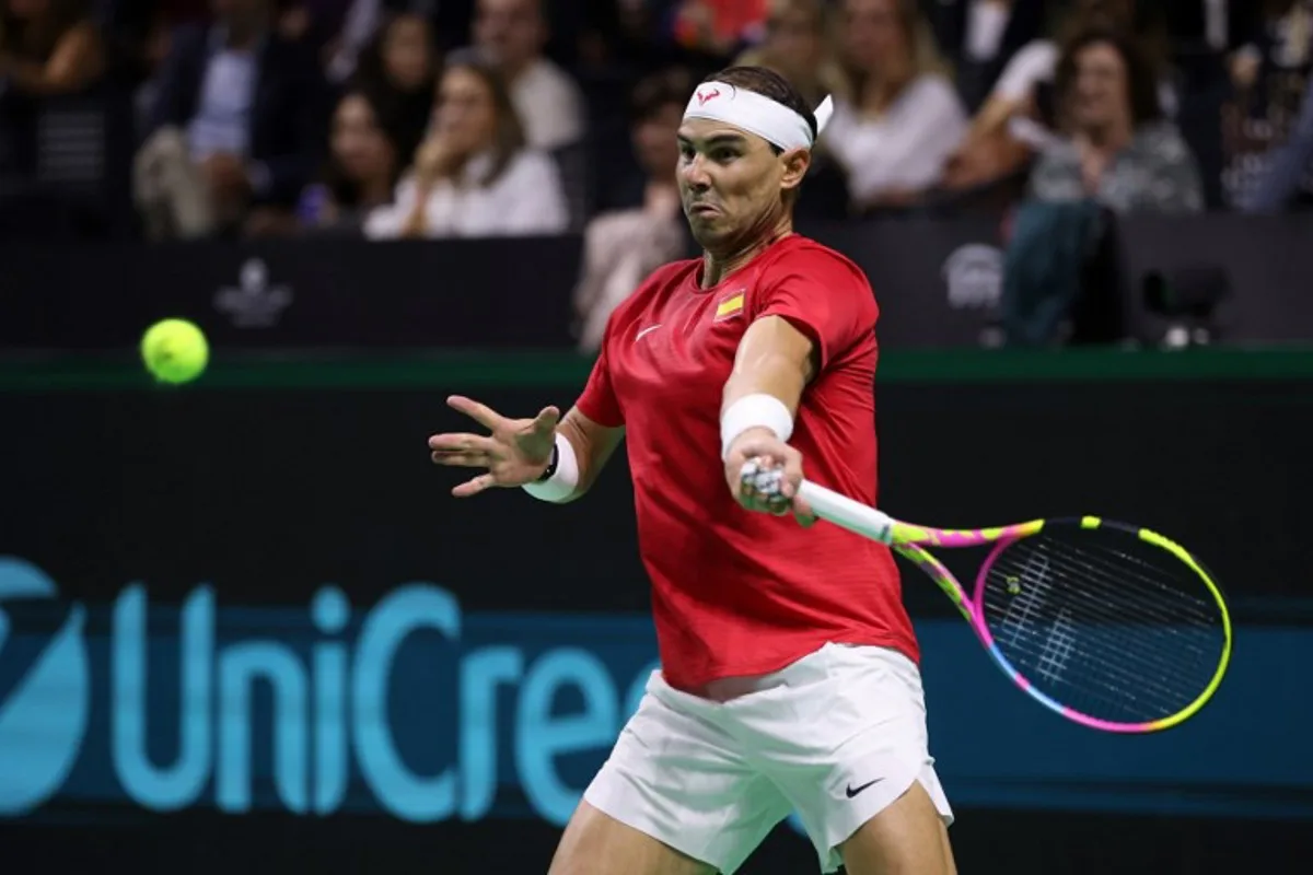 Spain's Rafael Nadal returns a shot to Netherlands' Botic van de Zandschulp in the quarter-final singles match between Netherlands and Spain during the Davis Cup Finals at the Palacio de Deportes Jose Maria Martin Carpena arena in Malaga, southern Spain, on November 19, 2024.  Thomas COEX / AFP