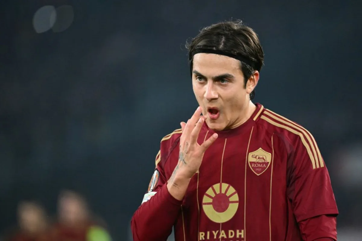 Roma's Argentine forward #21 Paulo Dybala reacts during the UEFA Europa League knockout round play-off 2nd leg football match between AS Roma and FC Porto at the Olympic stadium in Rome, on February 20, 2025.  Alberto PIZZOLI / AFP