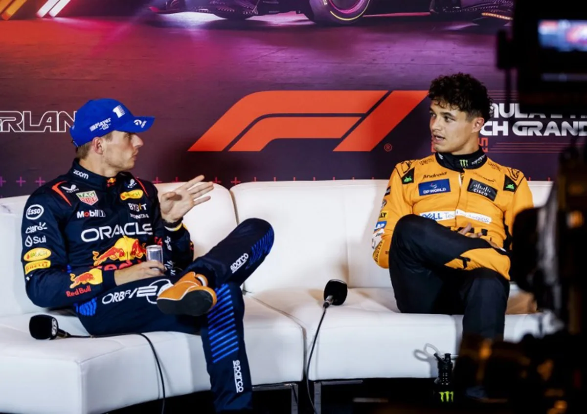 Second-placed Red Bull Racing's Dutch driver Max Verstappen speaks with first McLaren's British driver Lando Norris during a press conference following the qualifying session at The Circuit Zandvoort, western Netherlands, on August 24, 2024, ahead of the Formula One Dutch Grand Prix.  Remko de Waal / ANP / AFP