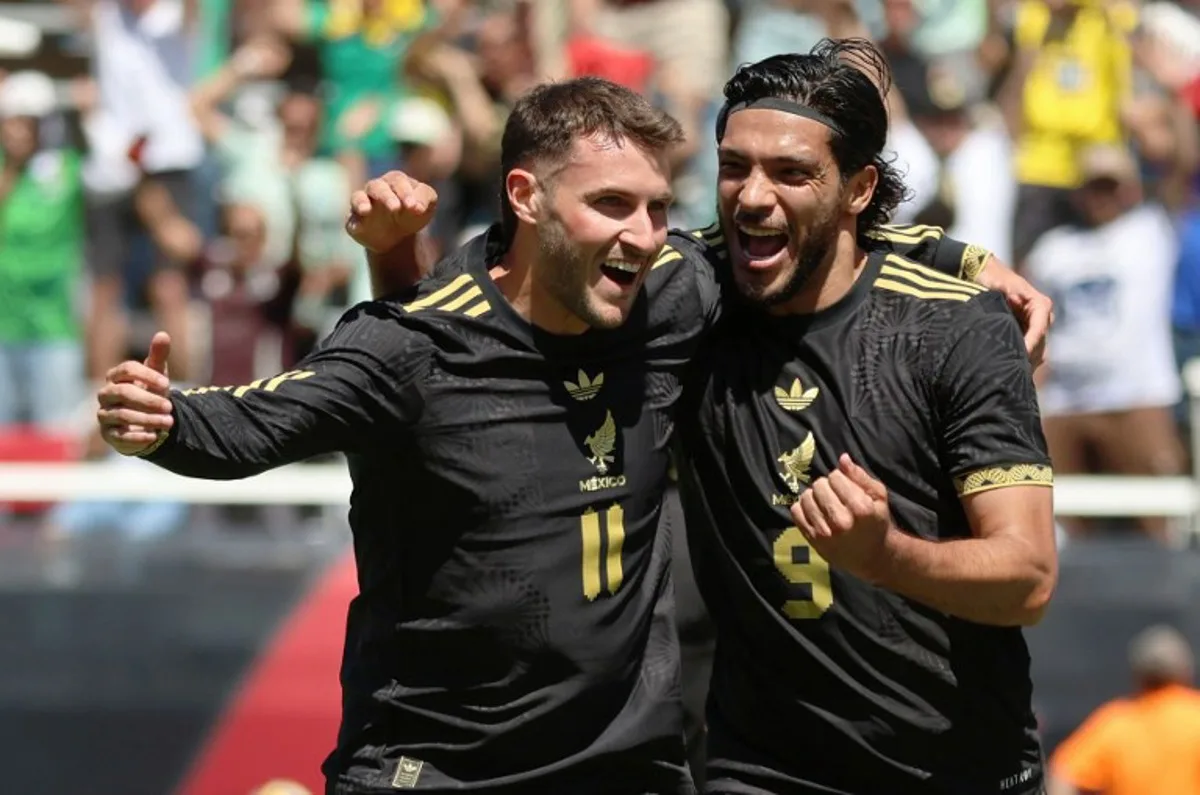 Mexico's forward #11 Santiago Gimenez celebrates scoring his team's first goal during the MexTour football match between Mexico and Switzerland at Rice-Eccles Stadium in Salt Lake City, Utah on June 7, 2025. Jeffrey D. Allred / AFP