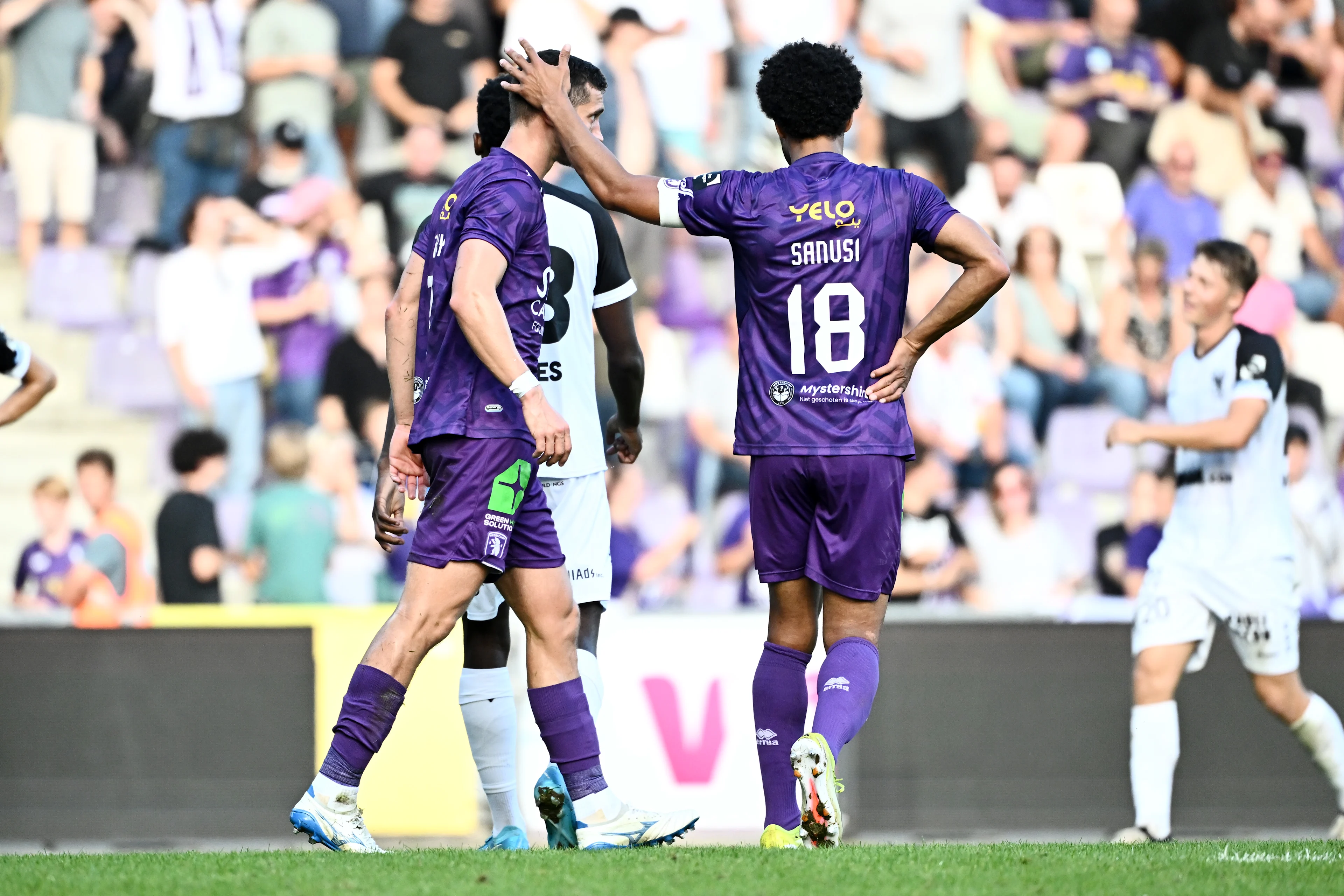 Beerschot's Herve Matthys and Beerschot's Ryan Sanusi pictured during a soccer match between Beerschot VA and Sint-Truiden VV, in Antwerp, on the eight day of the 2024-2025 season of the 'Jupiler Pro League' first division of the Belgian championship, Saturday 21 September 2024. BELGA PHOTO MAARTEN STRAETEMANS