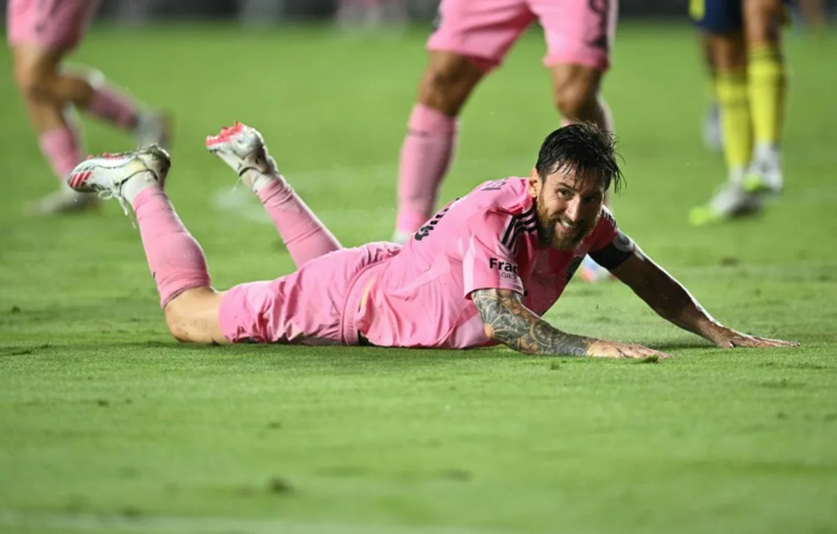 Inter Miami's Argentine forward #10 Lionel Messi falls during the Major League Soccer (MLS) regular season soccer match between Inter Miami CF and Nashville SC at Chase Stadium in Fort Lauderdale, Florida on July 12, 2025. CHANDAN KHANNA / AFP