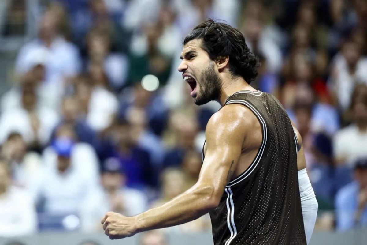 Spain's Carlos Alcaraz celebrates a point during the men's singles second round tennis match against Portugal's Jaime Faria on day four of the US Open tennis tournament at the USTA Billie Jean King National Tennis Center in New York City on September 2, 2026. CHARLY TRIBALLEAU / AFP