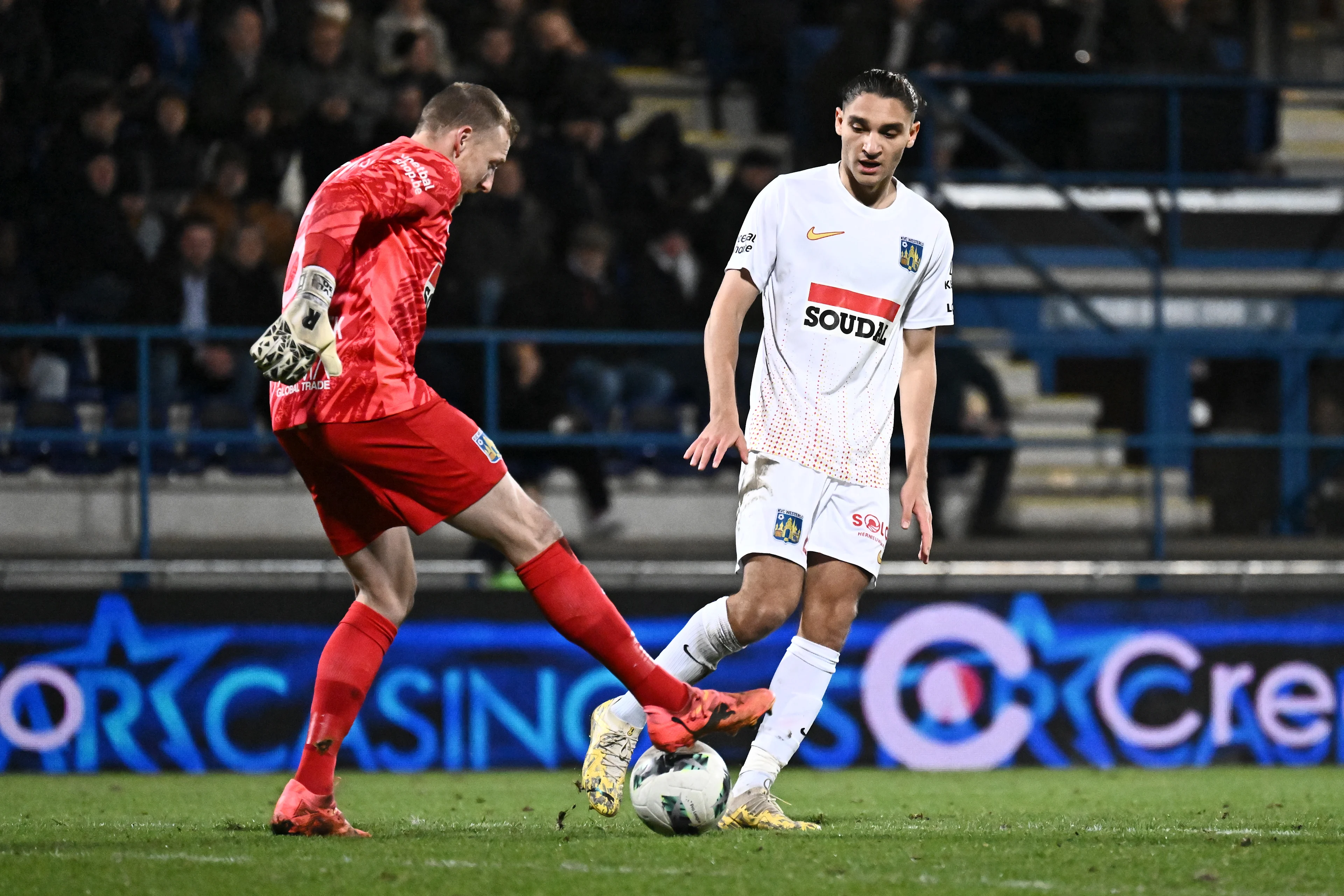 Westerlo's goalkeeper Koen Van Langendonck and Westerlo's Emir Ortakaya pictured during a soccer match between FCV Dender EH and KVC Westerlo, Sunday 08 December 2024 in Denderleeuw, on day 17 of the 2024-2025 season of the 'Jupiler Pro League' first division of the Belgian championship. BELGA PHOTO MAARTEN STRAETEMANS