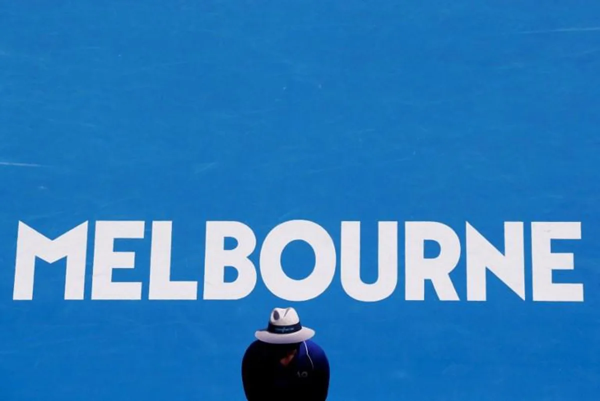 An official stands on the court during the men's singles quarter-final match between Greece's Stefanos Tsitsipas and Spain's Roberto Bautista Agut on day nine of the Australian Open tennis tournament in Melbourne on January 22, 2019.  DAVID GRAY / AFP -- IMAGE RESTRICTED TO EDITORIAL USE - STRICTLY NO COMMERCIAL USE --

