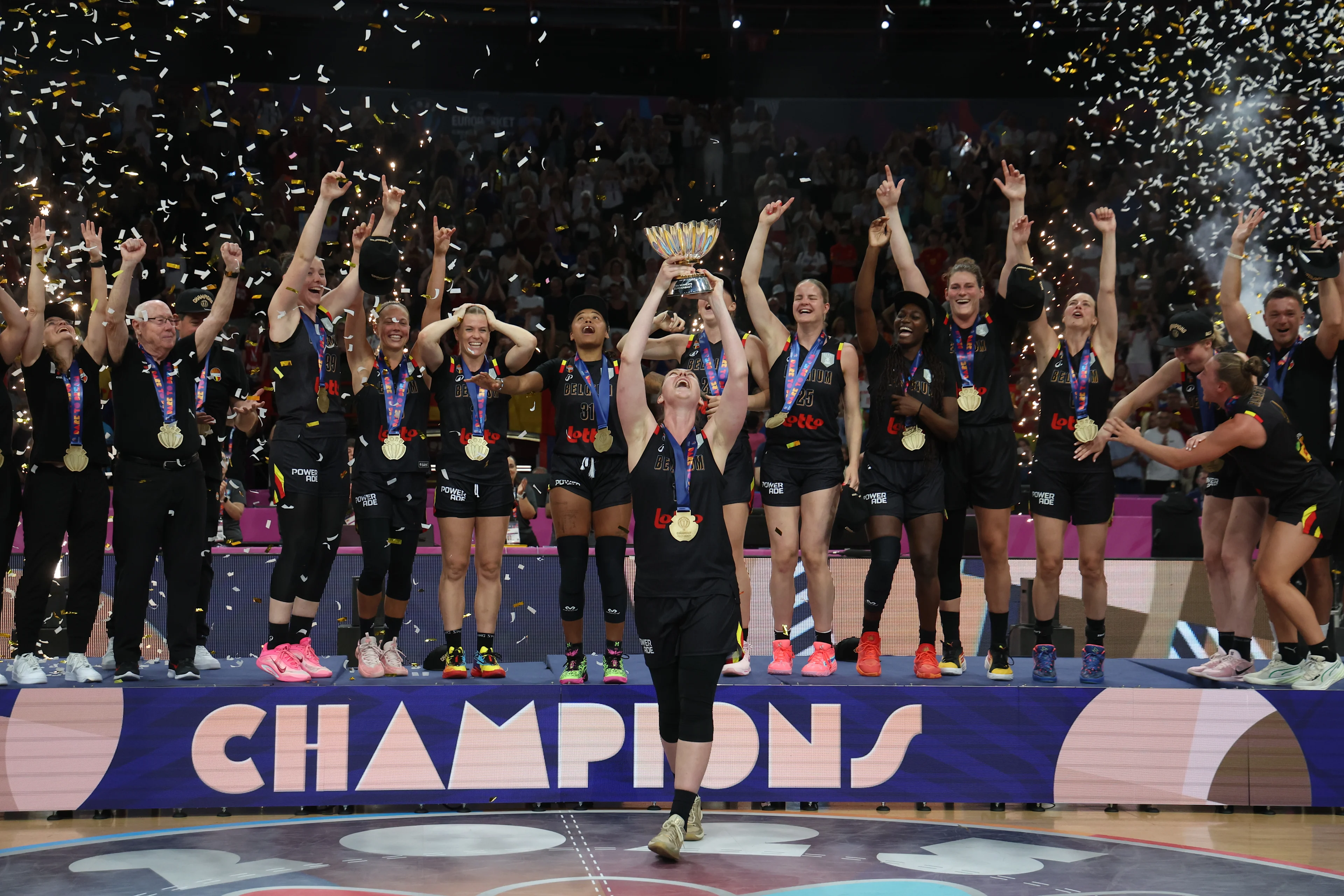 Belgium's captain Emma Meesseman celebrates this the cup on the podium after winning a basketball match between Spain and Belgian national team 'the Belgian Cats' on Sunday 29 June 2025 in Piraeus, Greece, the final of the FIBA Women's EuroBasket 2025. BELGA PHOTO VIRGINIE LEFOUR