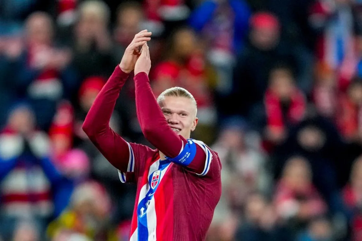 Norway's forward #09 Erling Braut Haaland celebrates the team's 4-1 victory after the 2026 World Cup Group I European qualification football match between Norway and Estonia in Oslo on November 13, 2025. Fredrik Varfjell / NTB / AFP
