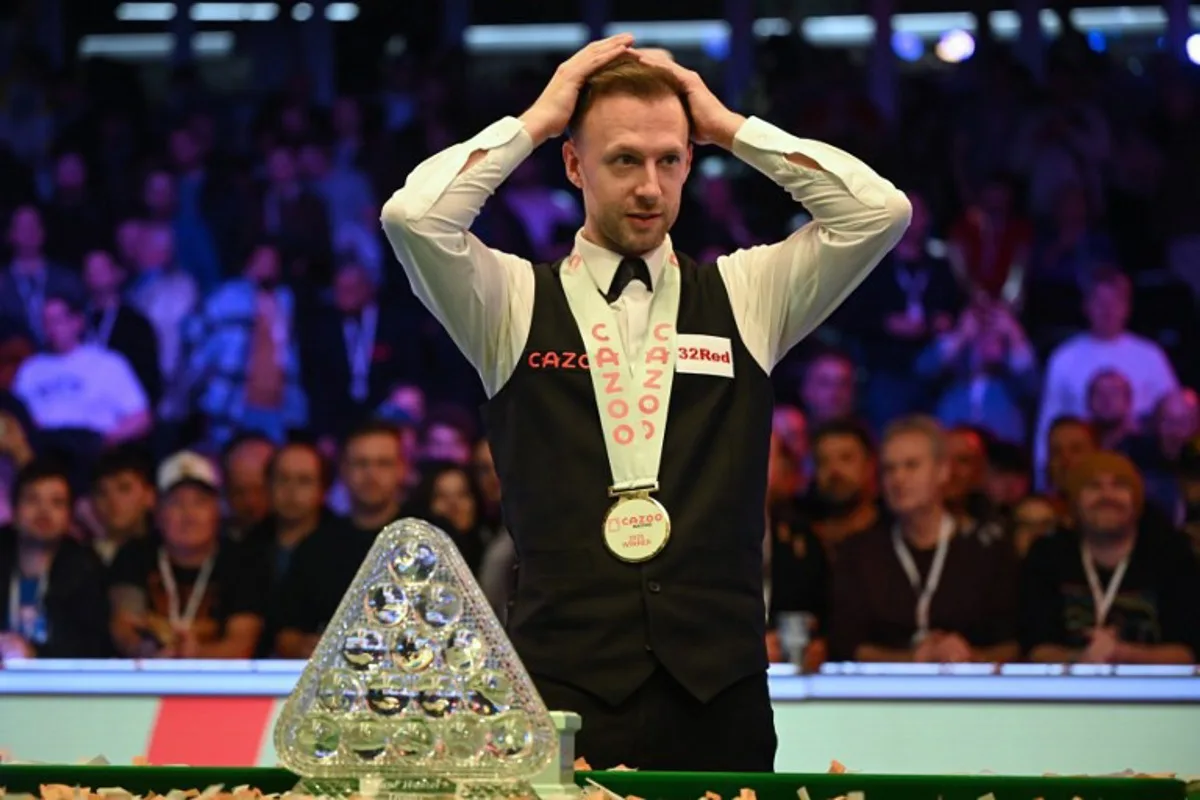 England's Judd Trump reacts at the presentation after his victory over Wales' Mark Williams in the Masters snooker tournament final at Alexandra Palace in London on January 15, 2023. Trump won the final 10-8. JUSTIN TALLIS / AFP