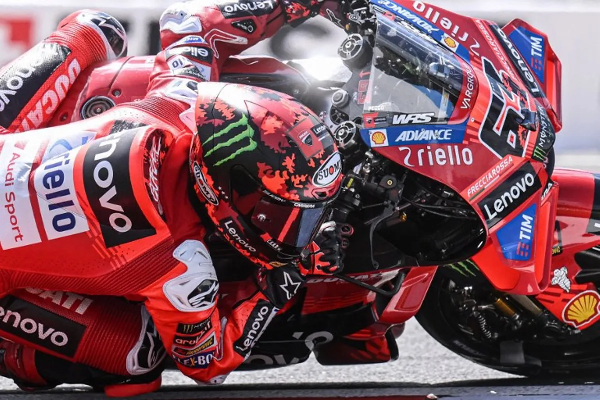 Ducati Lenovoi Team's French MotoGP rider Francesco Bagnaia competes competes during the MotoGP qualifying of Czech motorcycle Grand Prix in Brno, Czech Republic on July 19, 2025. Michal Cizek / AFP