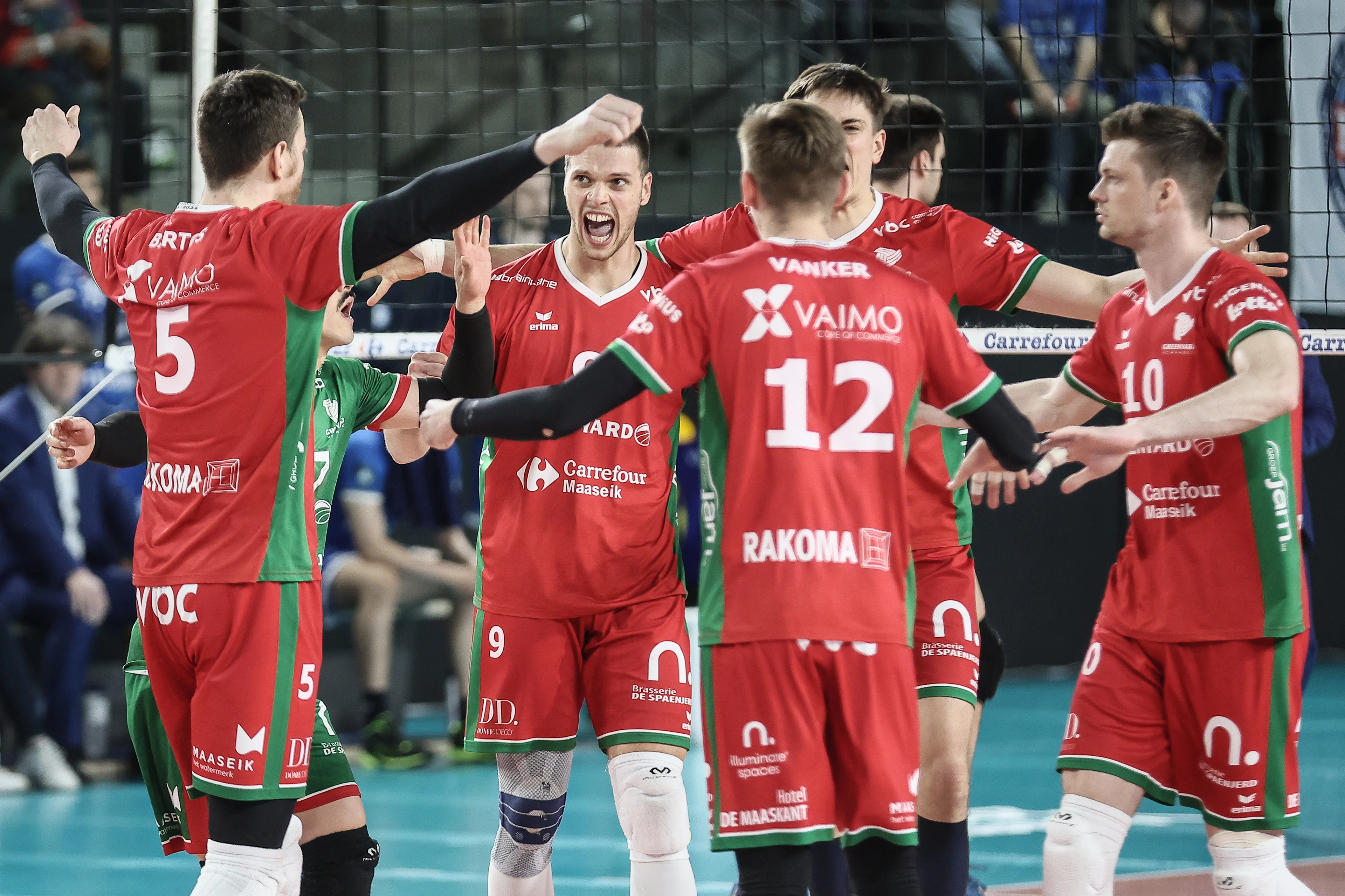 Maaseik's players celebrate during a volleyball match between Greenyard Maaseik and Knack Roeselare, Sunday 28 April 2024 in Maaseik, the last match of the best-of-five finals in the Play Offs of the Belgian volleyball competition. BELGA PHOTO BRUNO FAHY