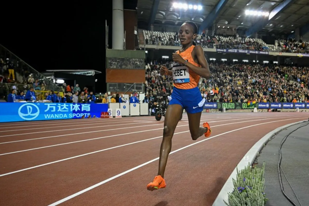Kenya's Beatrice Chebet competes to win the Women's 5000m final of the Memorial Van Damme Diamond League athletics finals at the Roi Baudouin Stadium in Brussels on September 14, 2024. NICOLAS TUCAT / AFP