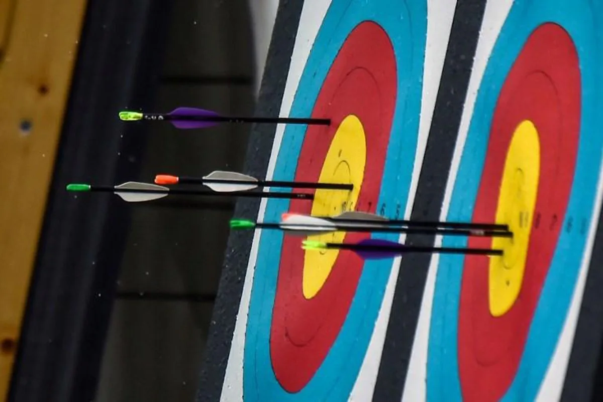Picture of targets and arrows taken during the Women's Archery Compound Team final during the 2018 Central American and Caribbean Games (CAC), in Barranquilla, Colombia, on July 31, 2018. Luis ROBAYO / AFP