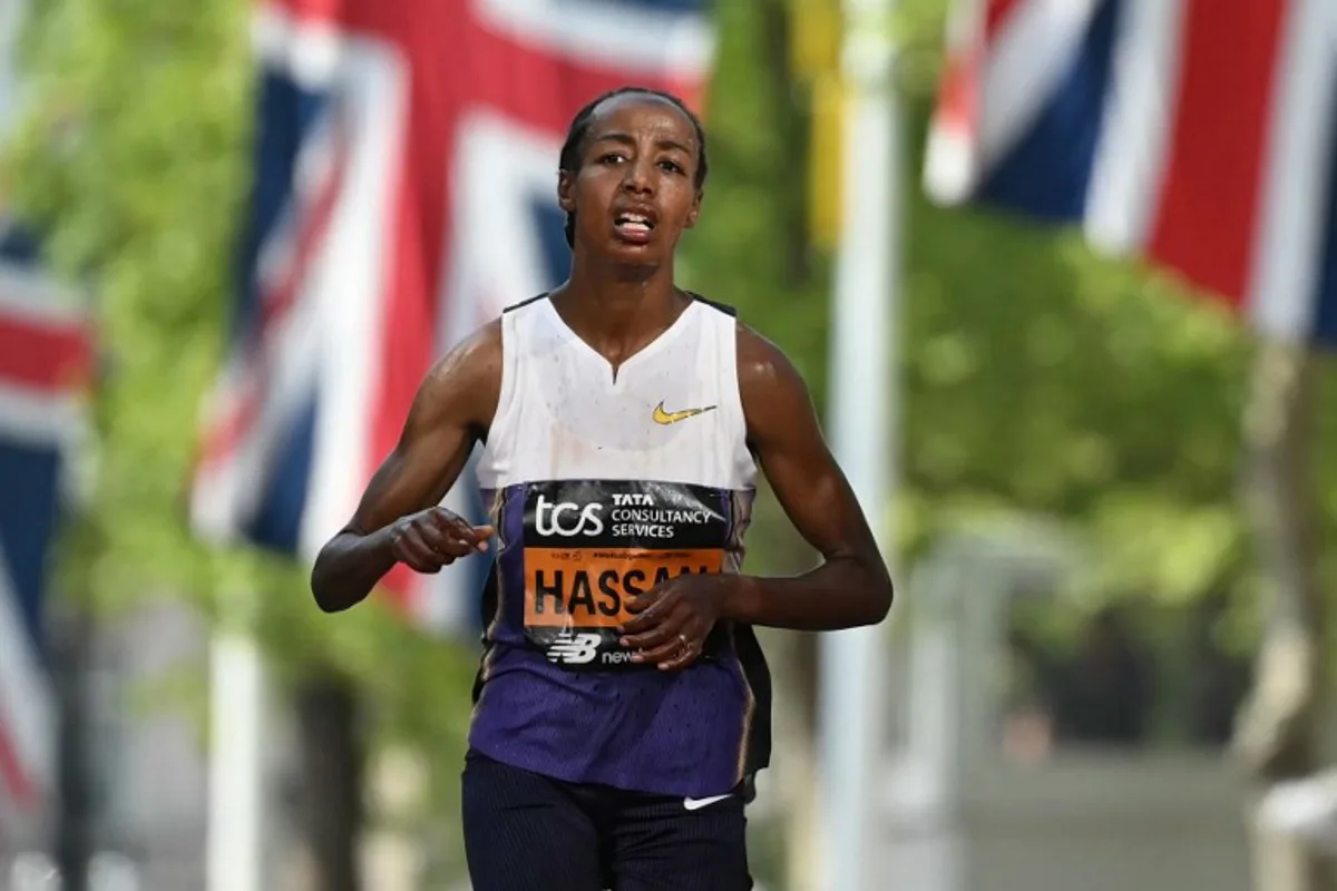 Netherland's Sifan Hassan crosses the line in third place in the women's race at the 2025 London Marathon in central London on April 27, 2025. JUSTIN TALLIS / AFP