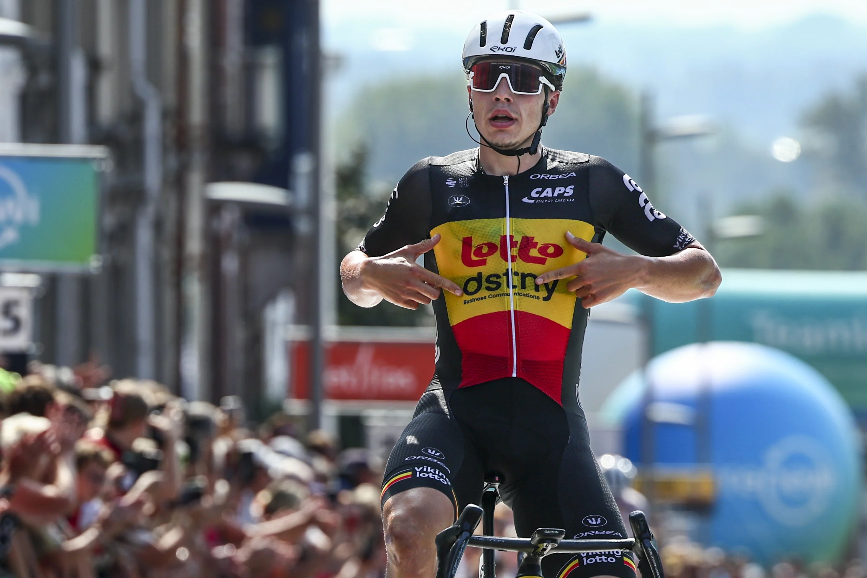 Belgian Arnaud De Lie of Lotto Dstny celebrates as he crosses the finish line to win the fifth and last stage of the 'Renewi Tour' multi-stage cycling race, from Menen to Geraardsbergen (202,5 km) on Sunday 01 September 2024. The five-day race takes place in Belgium and the Netherlands. BELGA PHOTO DAVID PINTENS