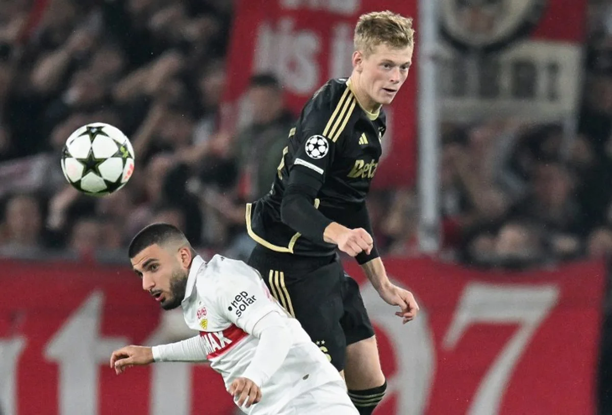 Stuttgart's German forward #26 Deniz Undav (L) and Praha's Czech defender #27 Filip Panak vie for the ball during the UEFA Champions League football match between VfB Stuttgart and Sparta Praha in Stuttgart, southwestern Germany on October 1, 2024.  THOMAS KIENZLE / AFP