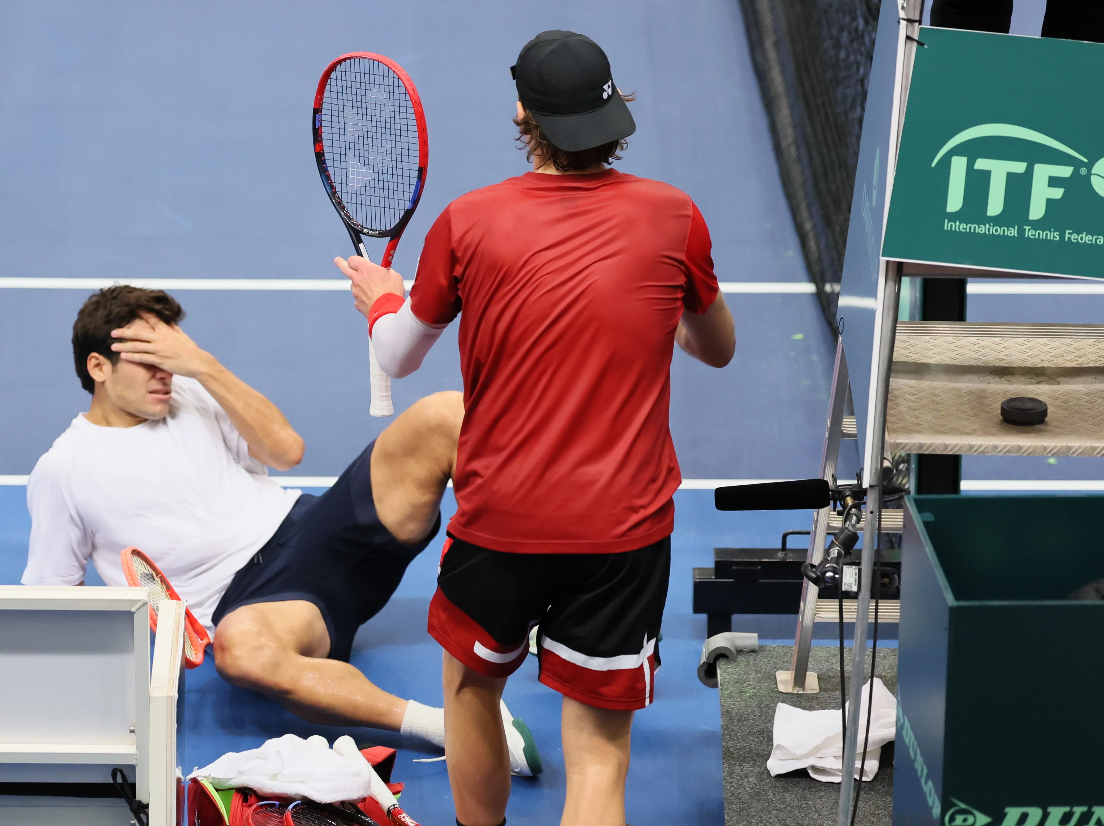 Chilean Cristian Garin and Belgian Zizou Bergs pictured during a game between Belgian Bergs and Chilean Garin, the fourth match in the Davis Cup qualifiers World Group tennis meeting between Belgium and Chile, , in Hasselt. BELGA PHOTO BENOIT DOPPAGNE