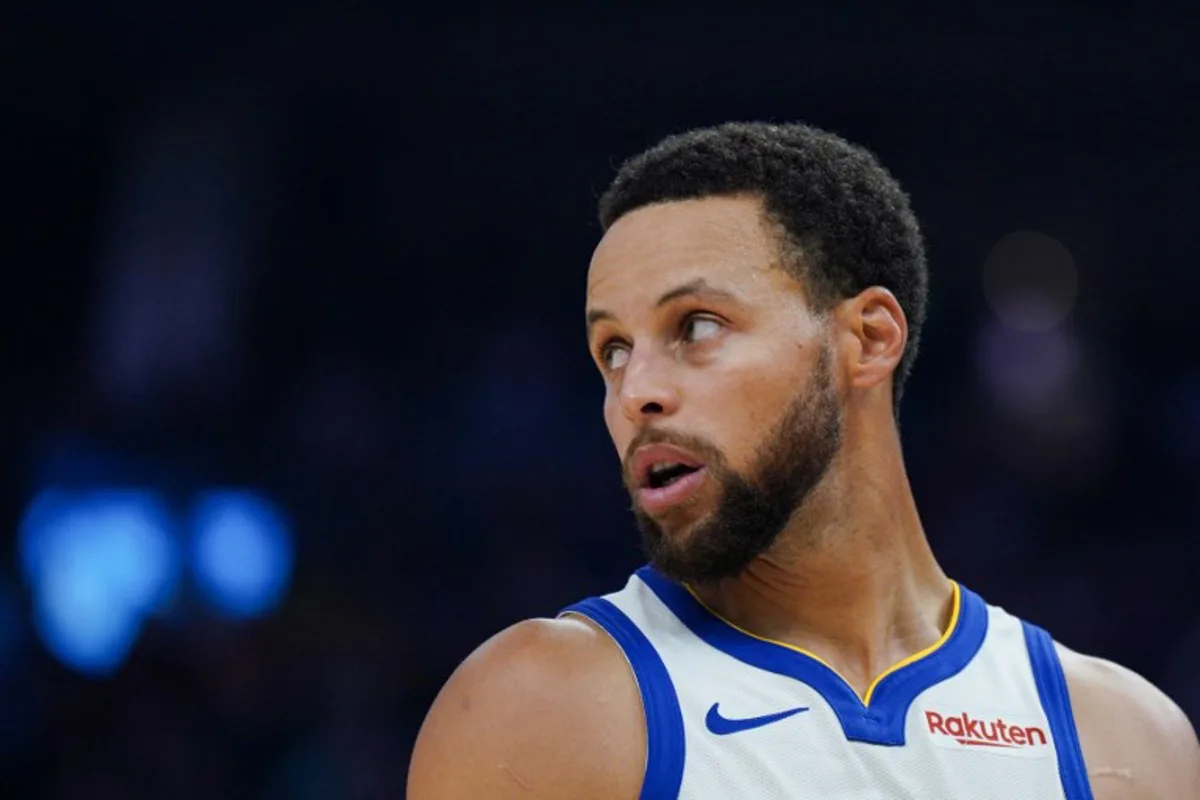 Golden State Warriors' US guard #30 Stephen Curry looks on during the NBA preseason game between the San Antonio Spurs and Golden State Warriors at Chase Center in San Francisco, California on October 20, 2023.   Loren Elliott / AFP