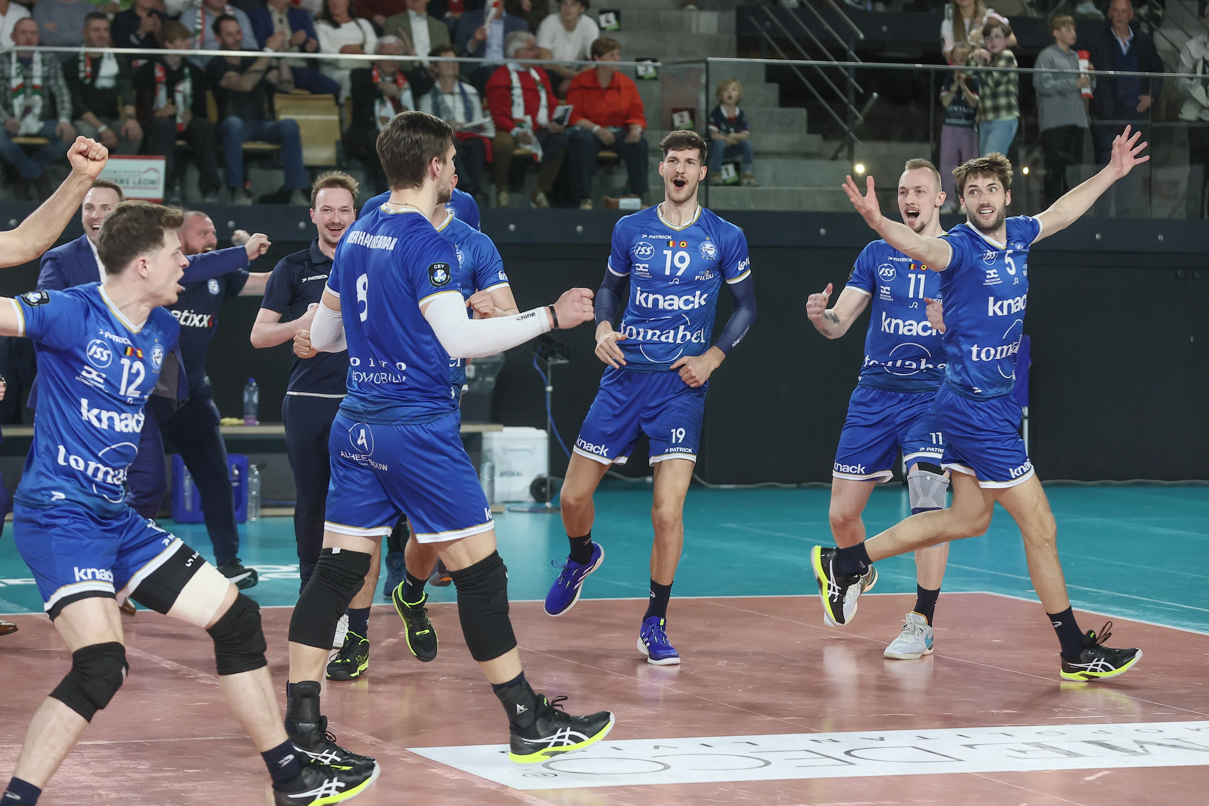 Roeselare's players celebrate after winning a volleyball match between Greenyard Maaseik and Knack Roeselare, Sunday 28 April 2024 in Maaseik, the last match of the best-of-five finals in the Play Offs of the Belgian volleyball competition. BELGA PHOTO BRUNO FAHY