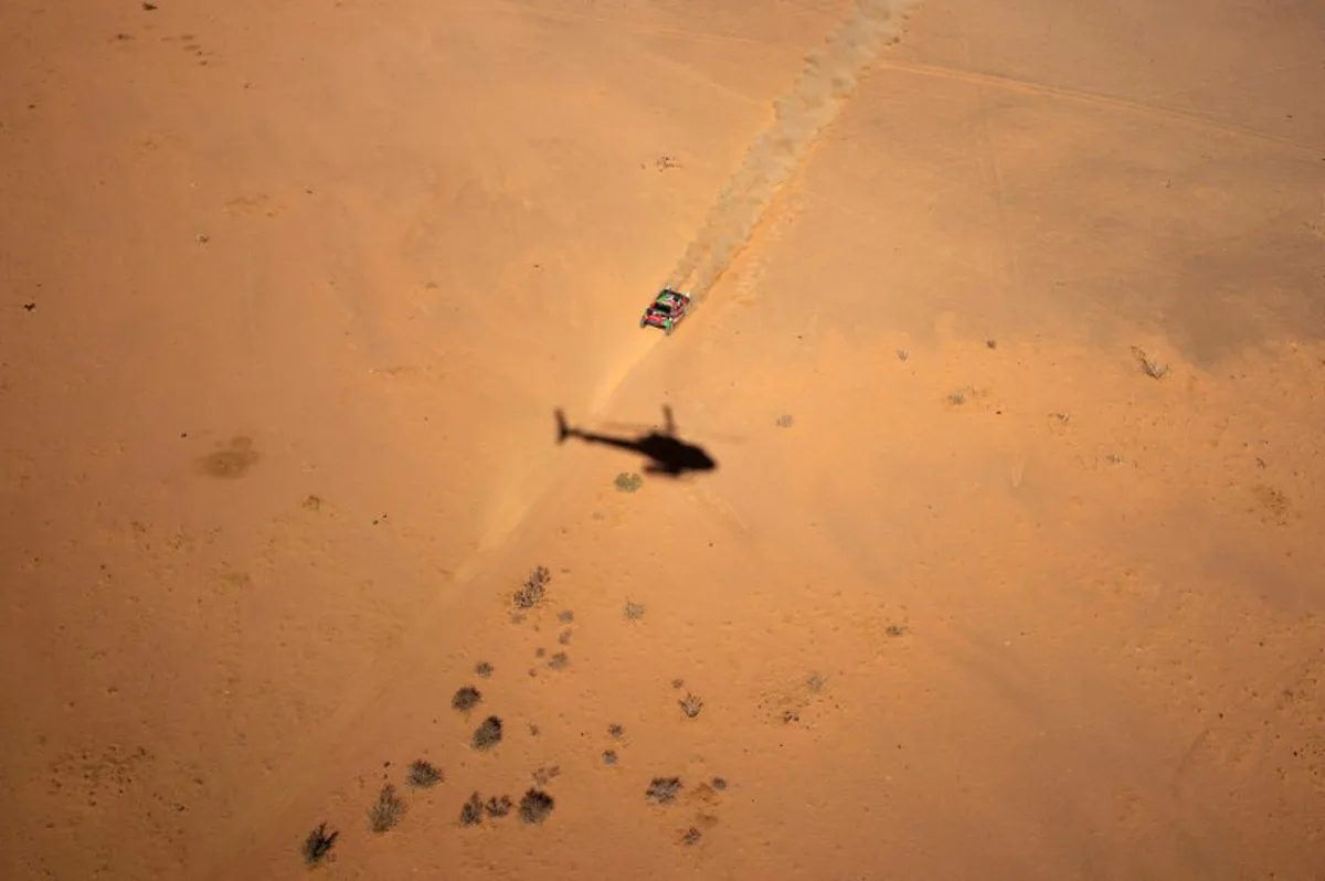 A driver competes in stage 2B of the 47th Dakar Rally between Bisha and Bisha, on January 6, 2025.  Valery HACHE / AFP