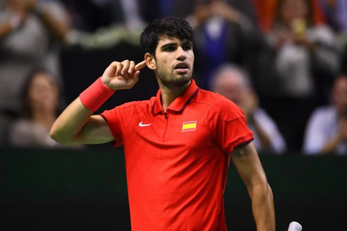 Spain's Carlos Alcaraz reacts in the quarter-final singles match between Netherlands and Spain during the Davis Cup Finals at the Palacio de Deportes Jose Maria Martin Carpena arena in Malaga, southern Spain, on November 19, 2024.  Jorge GUERRERO / AFP