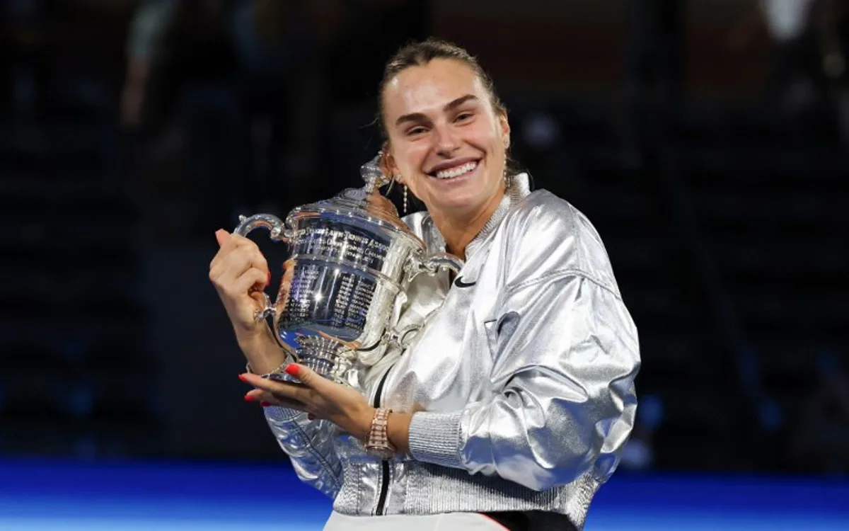 Belarus's Aryna Sabalenka poses with the trophy after defeating USA's Amanda Anisimova during their women's singles final tennis match on day fourteen of the US Open tennis tournament at the USTA Billie Jean King National Tennis Center in New York City, on September 6, 2025. TIMOTHY A.CLARY / AFP