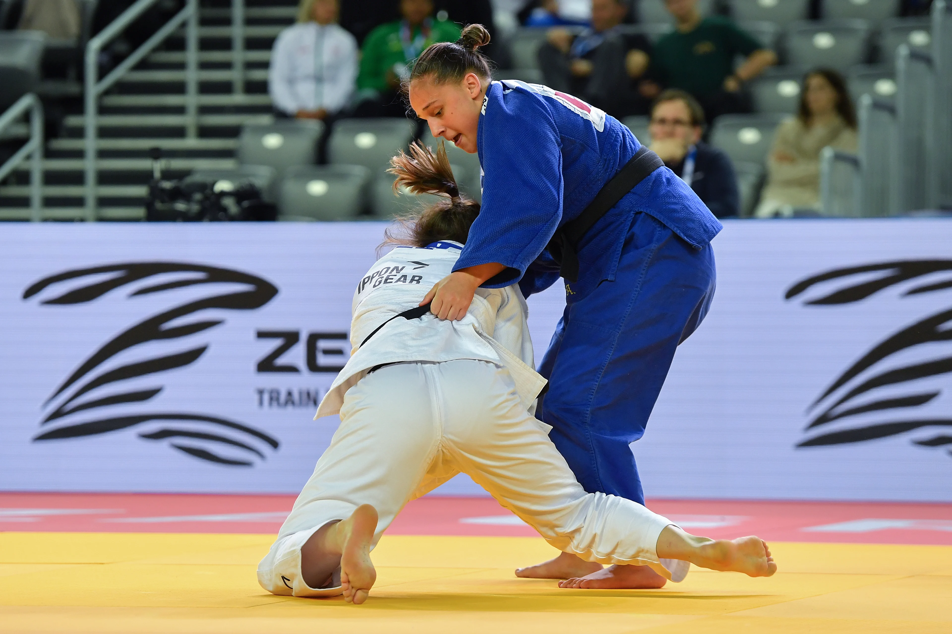 Czech Renata Zachova (white) and Belgian Alessia Corrao (blue) pictured in action during a fight in the women's -63kg pool A at the European Championships judo in Zagreb, Croatia on Friday 26 April 2024. The tournament is taking place from 25 tot 27 April.  BELGA PHOTO NIKOLA KRISTC