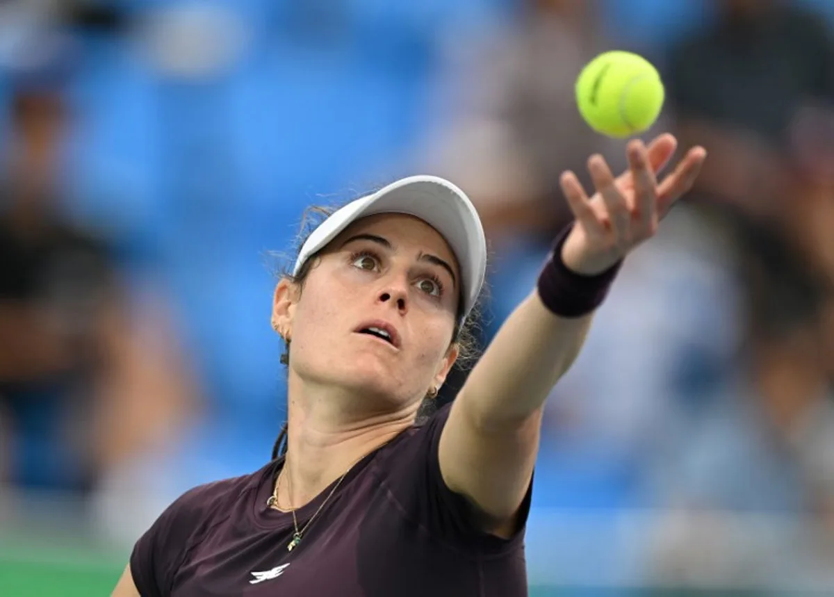 Kimberly Birrell of Australia serves against Anna Bondar of Hungary during their women's singles semi-final match at the Korea Open tennis championships in Seoul on September 26, 2026.  Jung Yeon-je / AFP