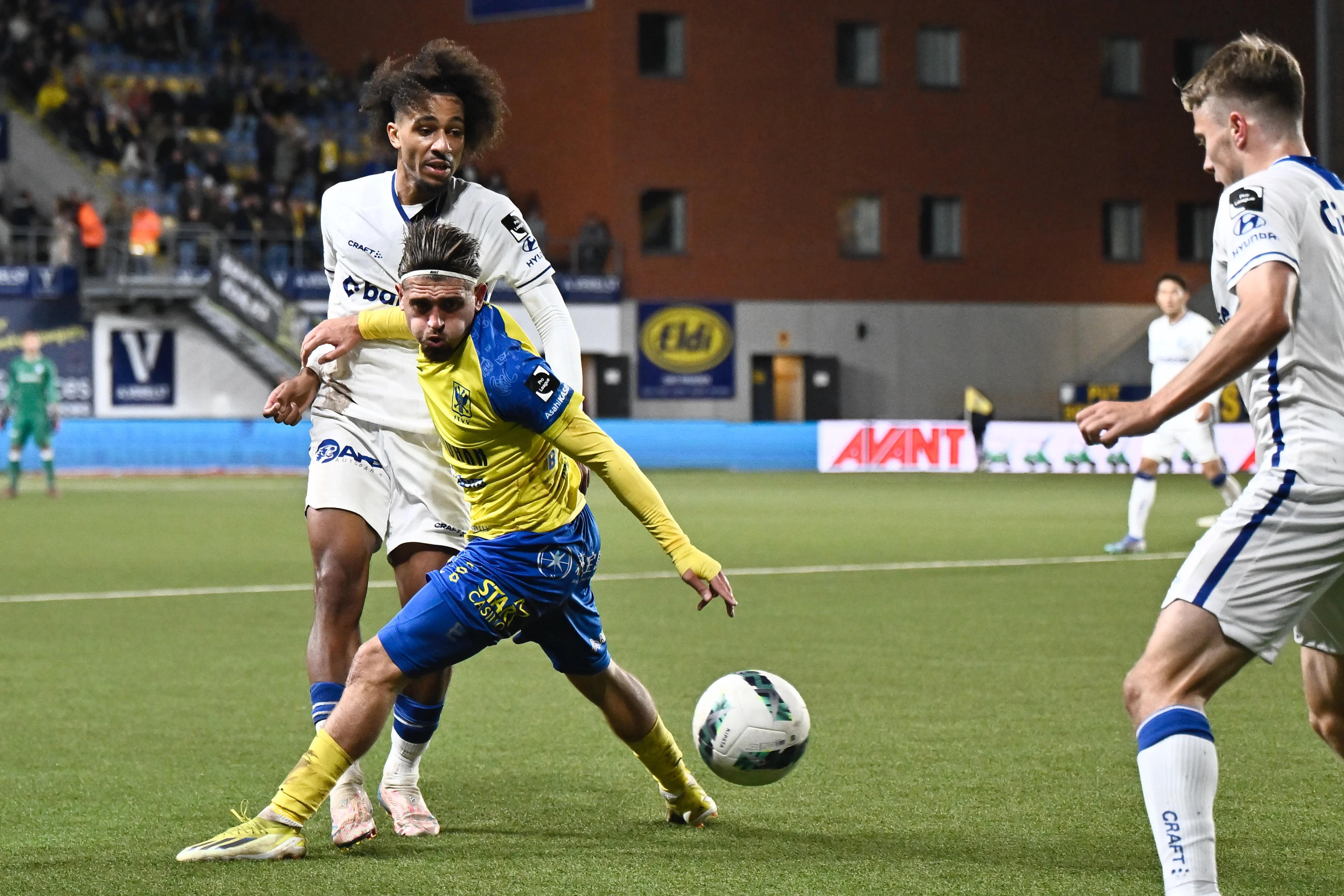 Gent's Hugo Gambor and STVV's Adriano Bertaccini fight for the ball during a soccer match between STVV Sint-Truidense VV and KAA Gent, in Sint-Truiden, on day 10 of the 2024-2025 season of the 'Jupiler Pro League' first division of the Belgian championship, Sunday 06 October 2024. BELGA PHOTO JOHAN EYCKENS