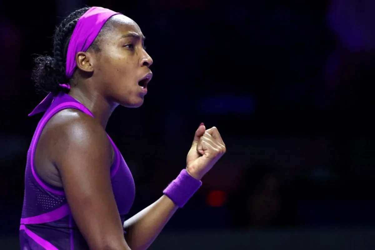 US' Coco Gauff reacts after winning a point from Poland's Iga Swiatek during their women's singles tennis match at the WTA Finals Championship in Riyadh on November 5, 2024.  Fayez NURELDINE / AFP