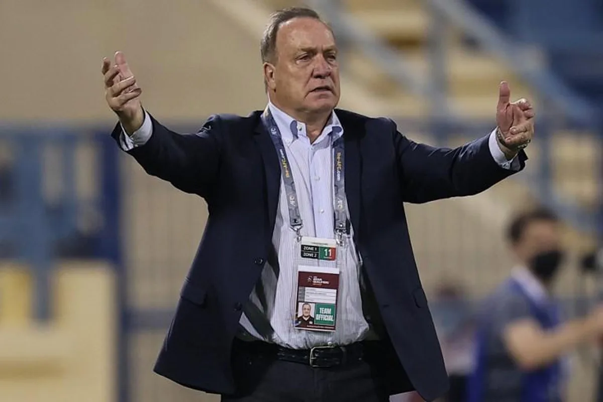 Iraq's coach Dick Advocaat reacts during the 2022 Qatar World Cup Asian Qualifiers football match between Iraq and Syria, at the Thani Bin Jassim Stadium in the Qatari capital Doha, on November 11, 2021.  KARIM JAAFAR / AFP