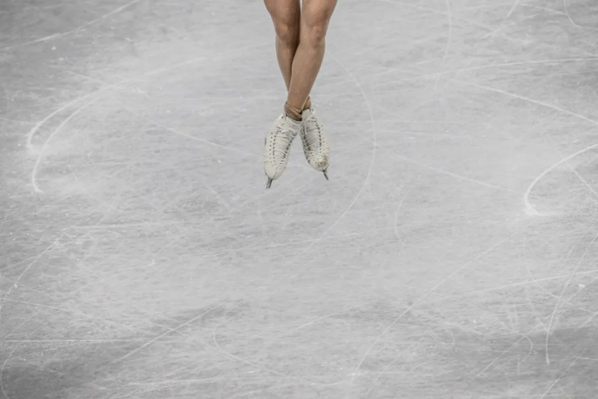 Close up of South Korea's Kim Ye-lim skates as she competes in the women's single skating free skating of the figure skating event during the Beijing 2022 Winter Olympic Games at the Capital Indoor Stadium in Beijing on February 17, 2022.  Jeff PACHOUD / AFP