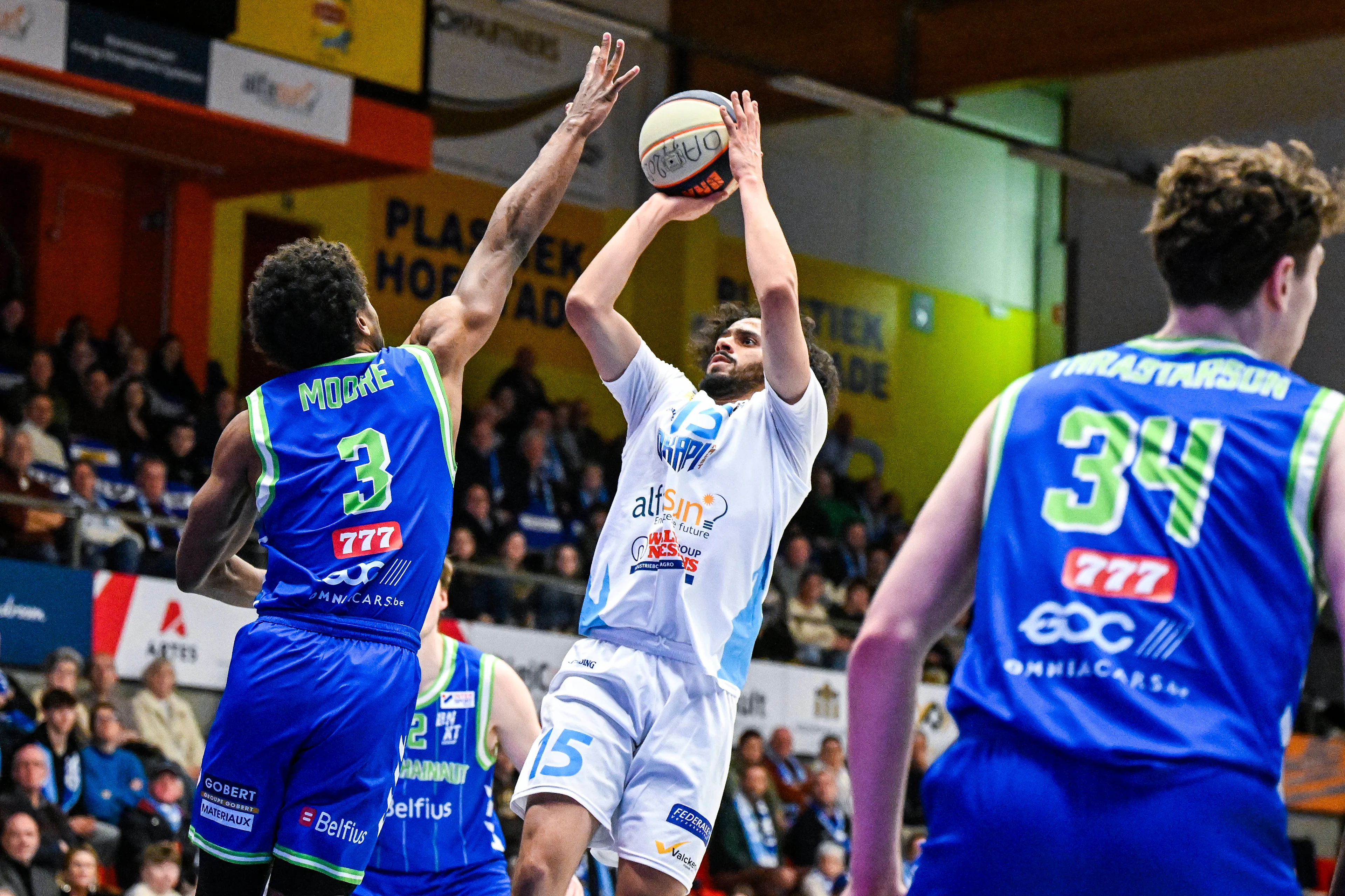 Mons' Marquise Moore and Aalst's Trevian Tennyson pictured in action during a basketball match between Spirou Charleroi and Mons-Hainaut, Saturday 11 January 2025 in Charleroi, on day 18 of the 'BNXT League' Belgian and Dutch first division basket championships. BELGA PHOTO TOM GOYVAERTS