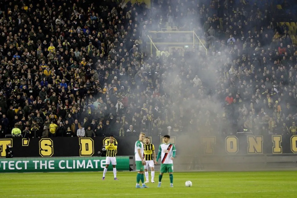 Supporters cheer players prior to the Conference League Play-off match between Vitesse and Rapid Vienna in the Gelredome in Arnhem, Netherlands, on February 24, 2022. Jeroen Putmans / ANP / AFP