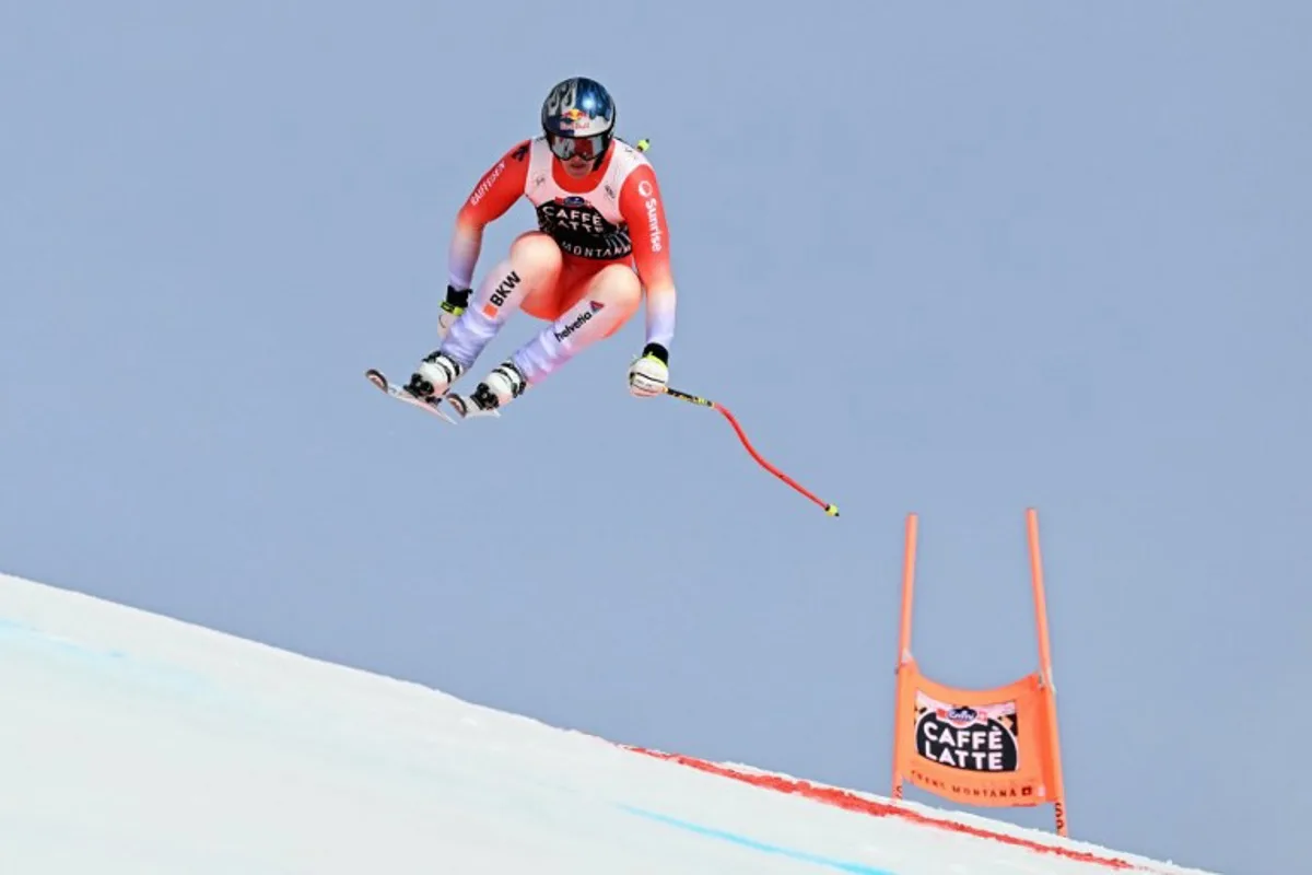 Switzerland's Franjo Von Allmen competes in the men's downhill event at the FIS Alpine Skiing World Cup in Crans-Montana on February 22, 2025.  Fabrice COFFRINI / AFP